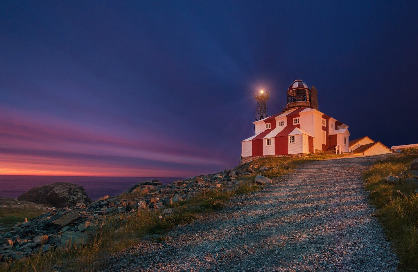 The Cape Bonavista lighthouse in Bonavista, Newfoundland, against the last, fading light of a summer sunset.

This whole day had been overcast and drizzling. I got to chatting with another photographer at the nearby puffin colony that afternoon, and 