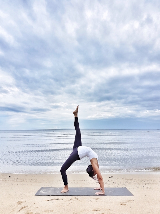 One-legged wheel pose in Batangas