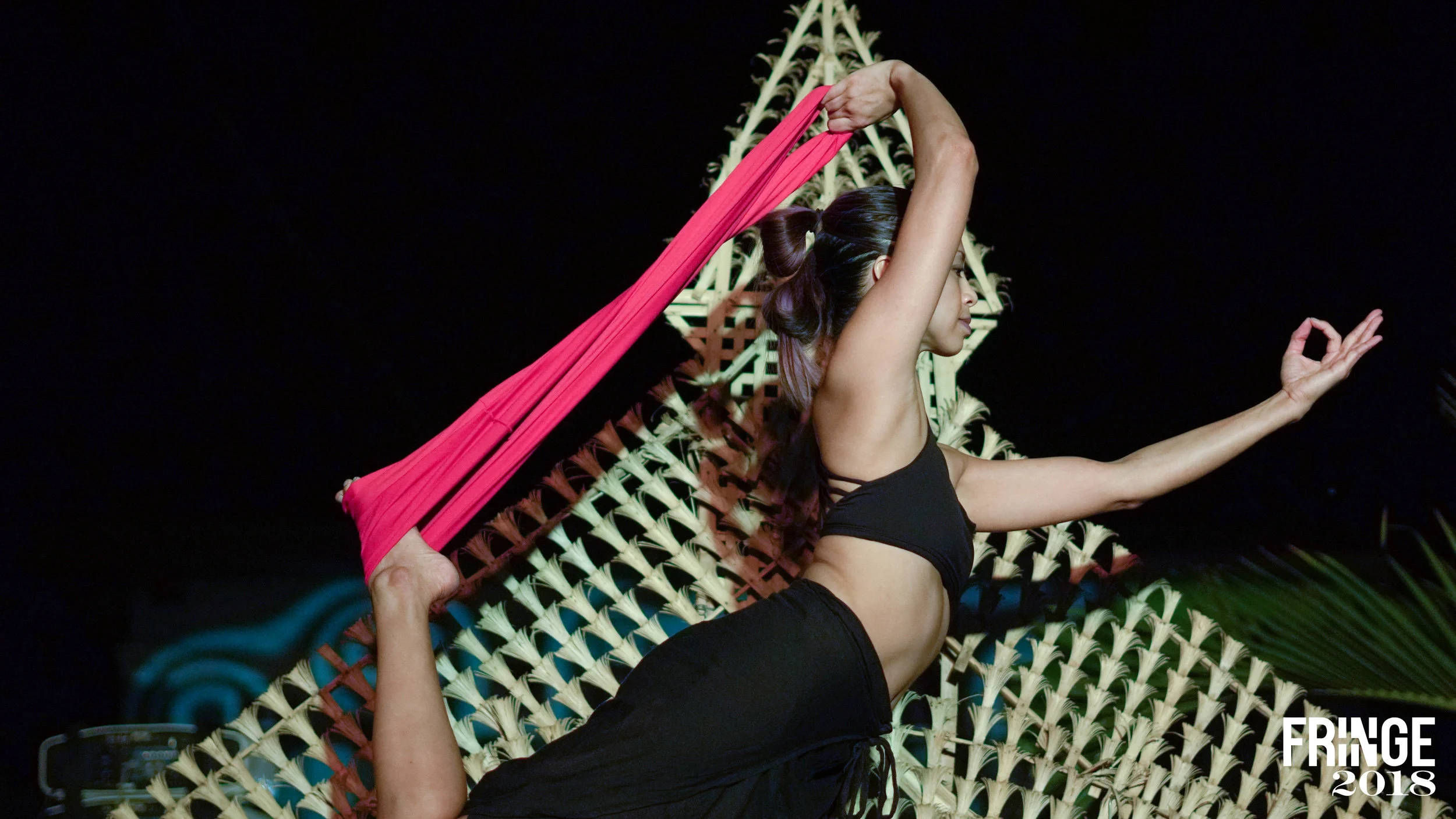 Kaye demonstrating Pineapple Flower Yoga // Courtesy of FringeMNL