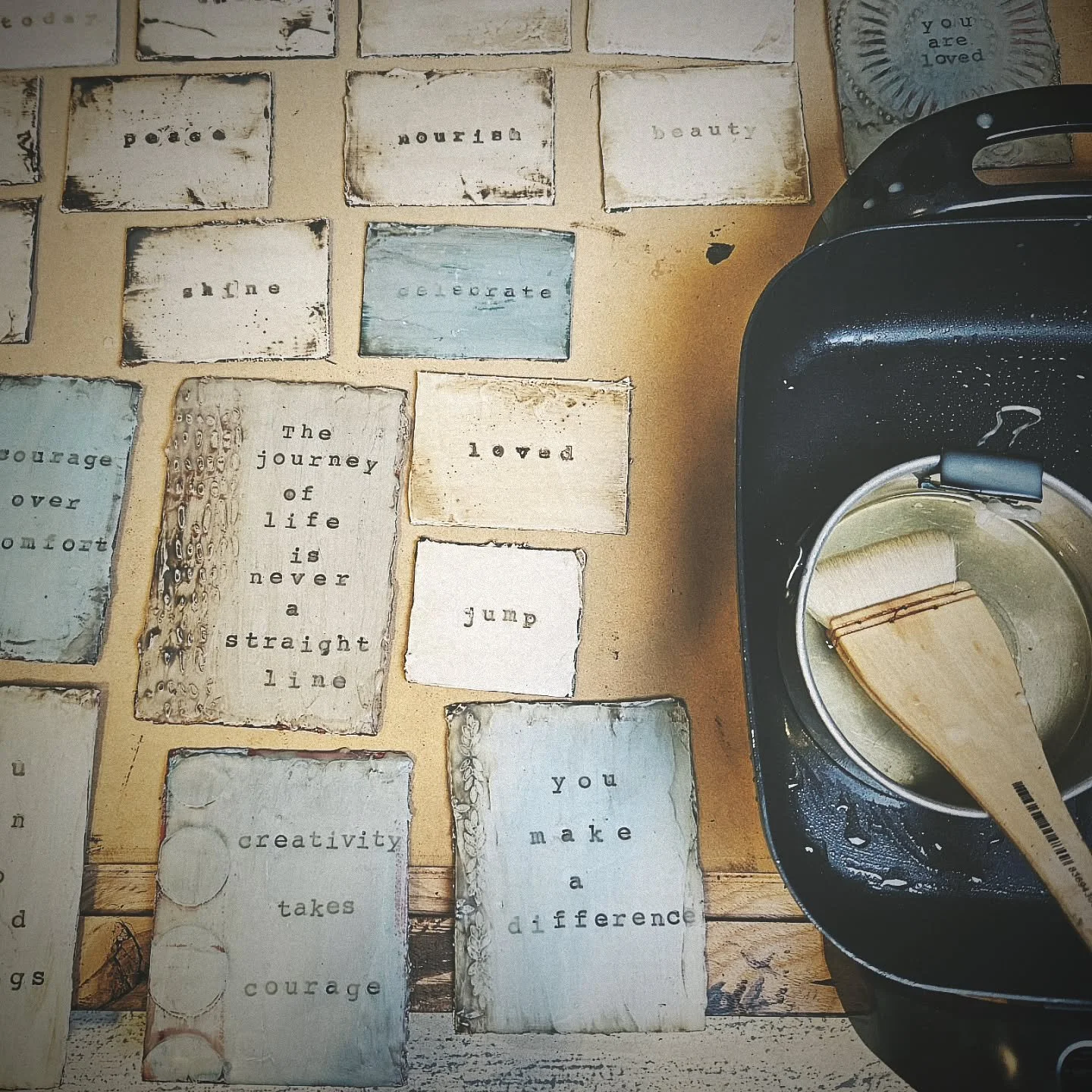 After uploading my latest YouTube video (all about my simple encaustic setup) I heated up the wax and applied it to some older art including these bookcover cards. Reminding me once again that one thing really does lead to another. 

To watch video -