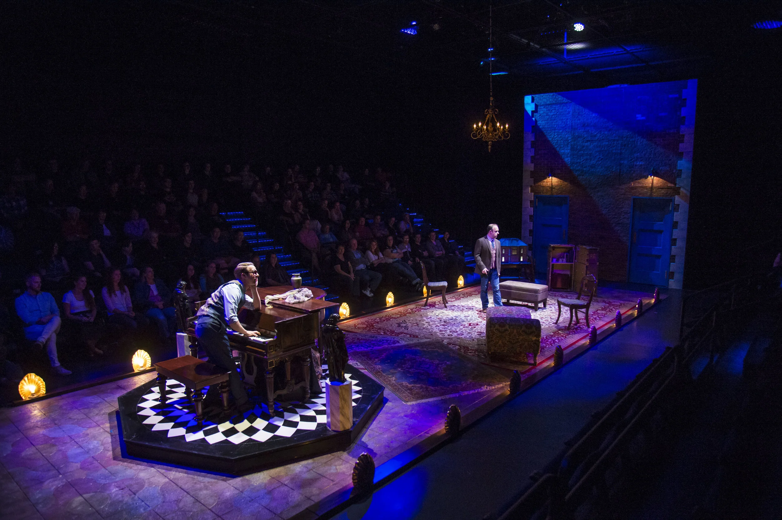 John Wascavage (left) as The Suspects and Paul Helm as Marcus Moscowicz in the Utah Shakespeare Festival’s 2016 production of Murder for Two. (Photo by Karl Hugh. Copyright Utah Shakespeare Festival 2016.)