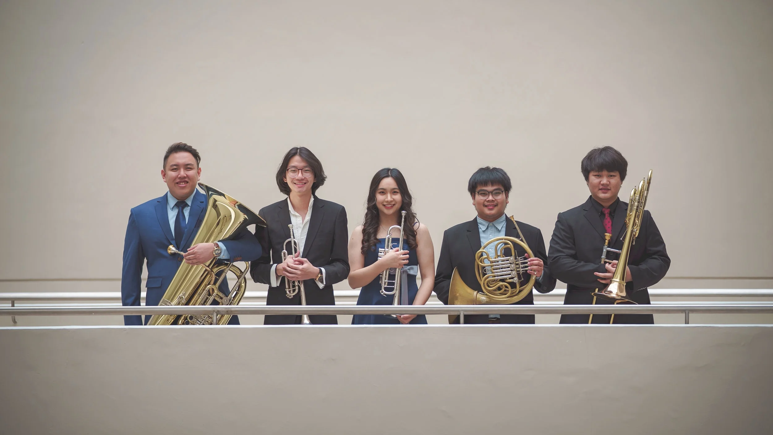 Kong (second from left) with his brass quintet, Brass Lightyear