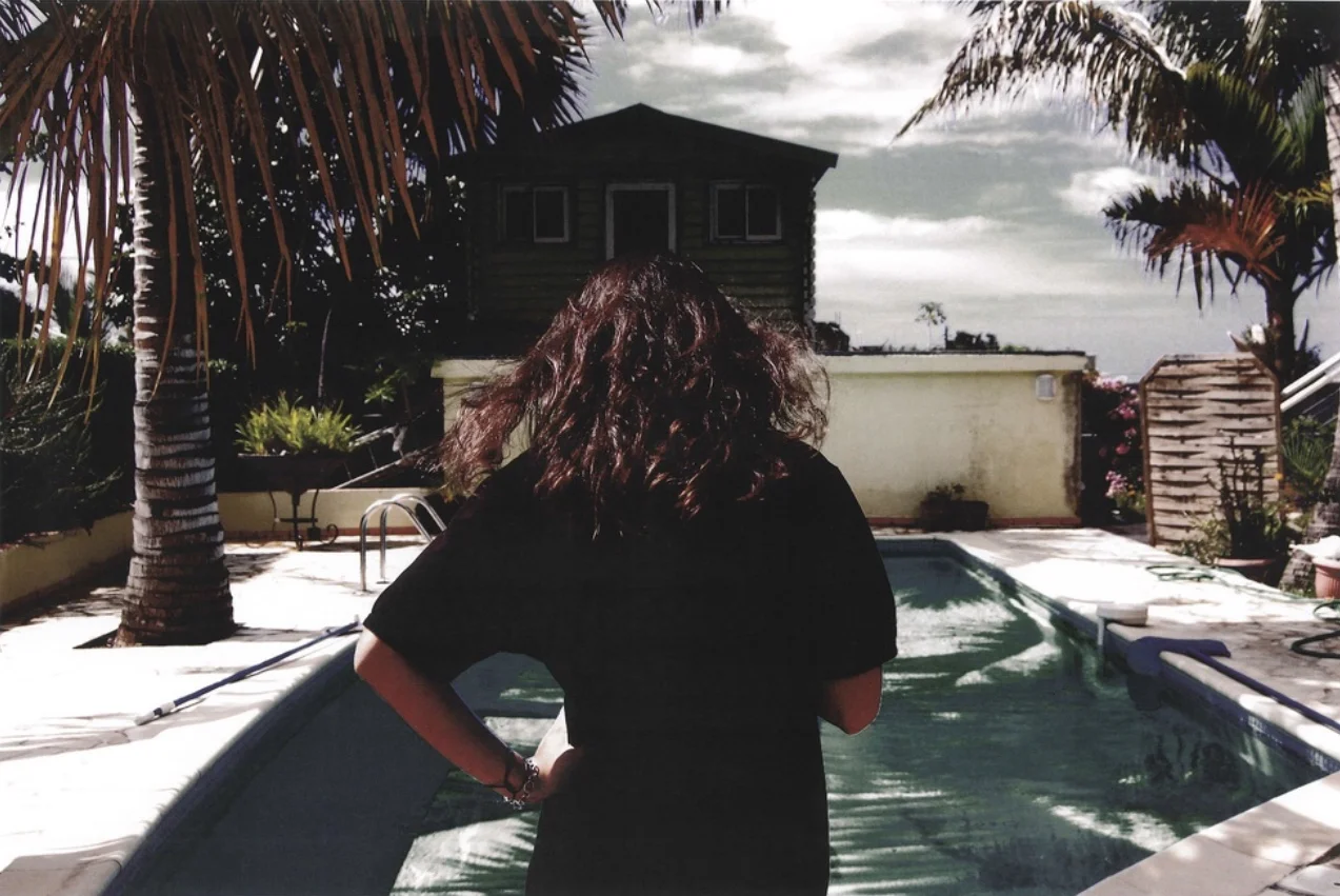 Krystie by the pool (from behind), 2010