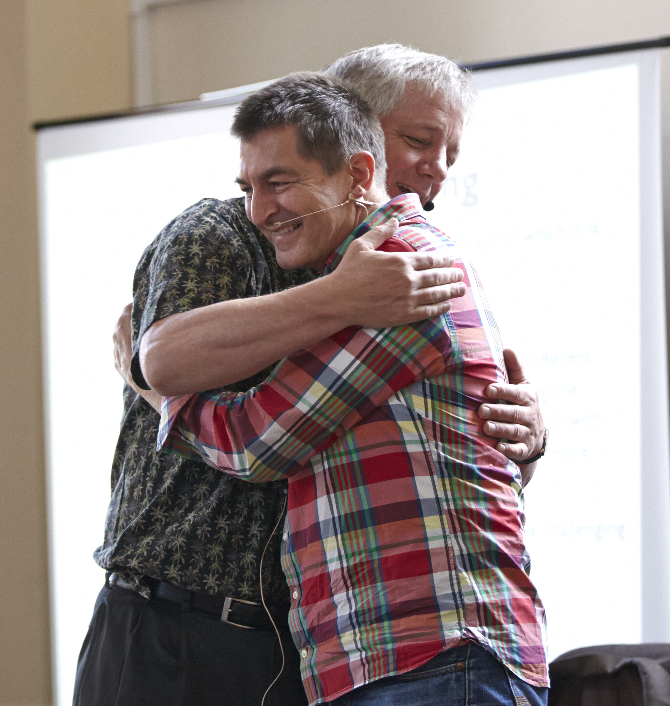 Steve and client hug.png