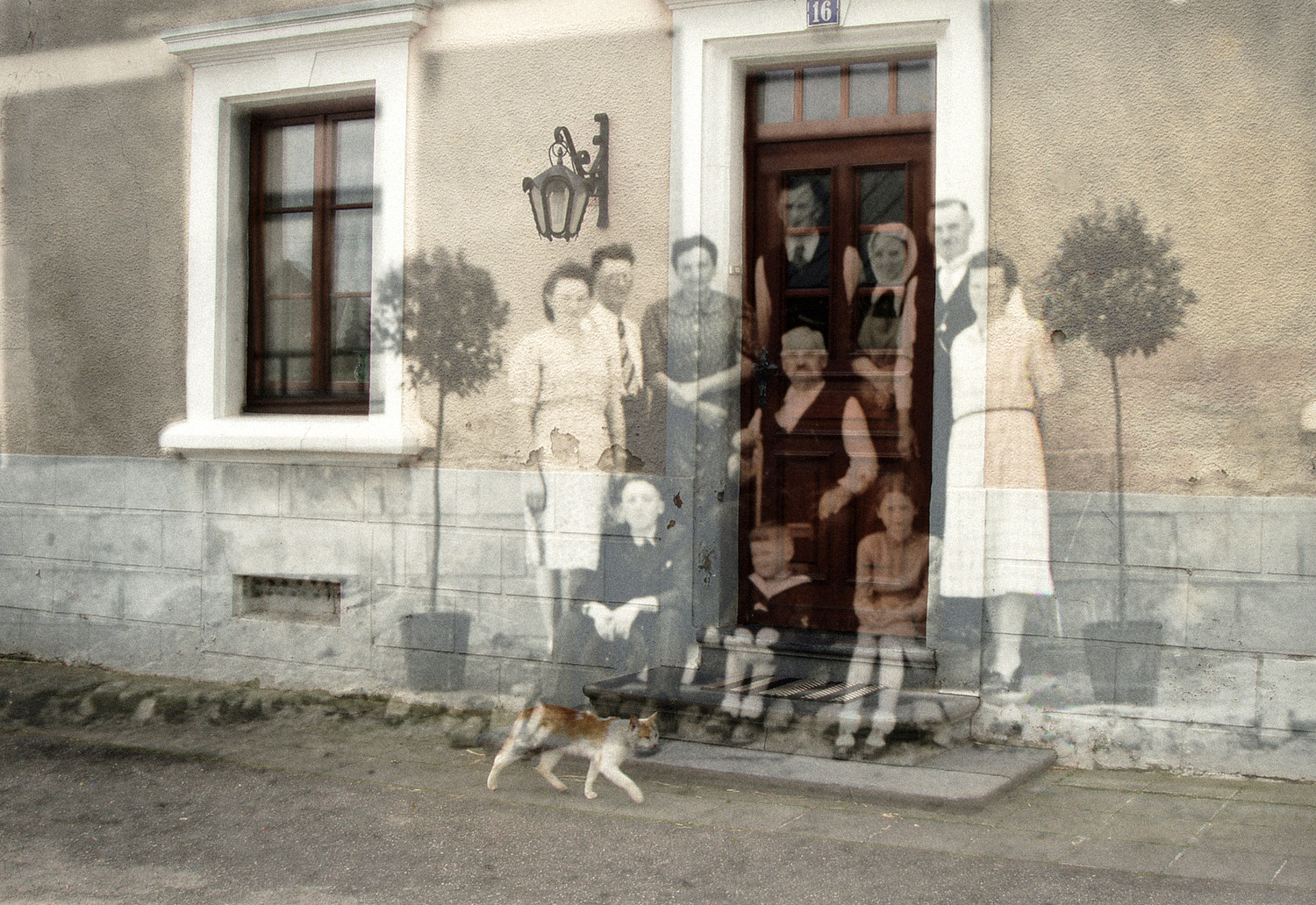 Anni-with-her-family-on-front-porch.jpg