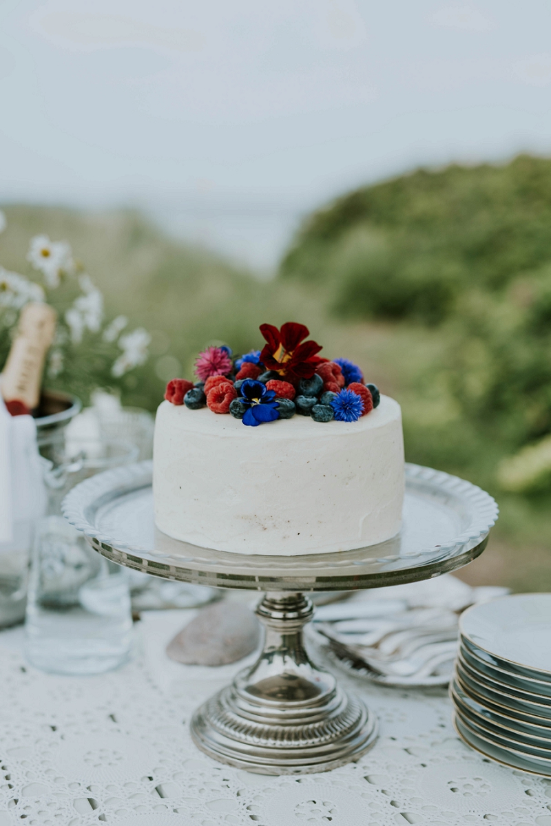 Artisan wedding cake with berries &amp; flowers | full-service destination wedding | get married in Denmark | Aero Island | Danish Island Weddings | Denmark wedding planners and venue