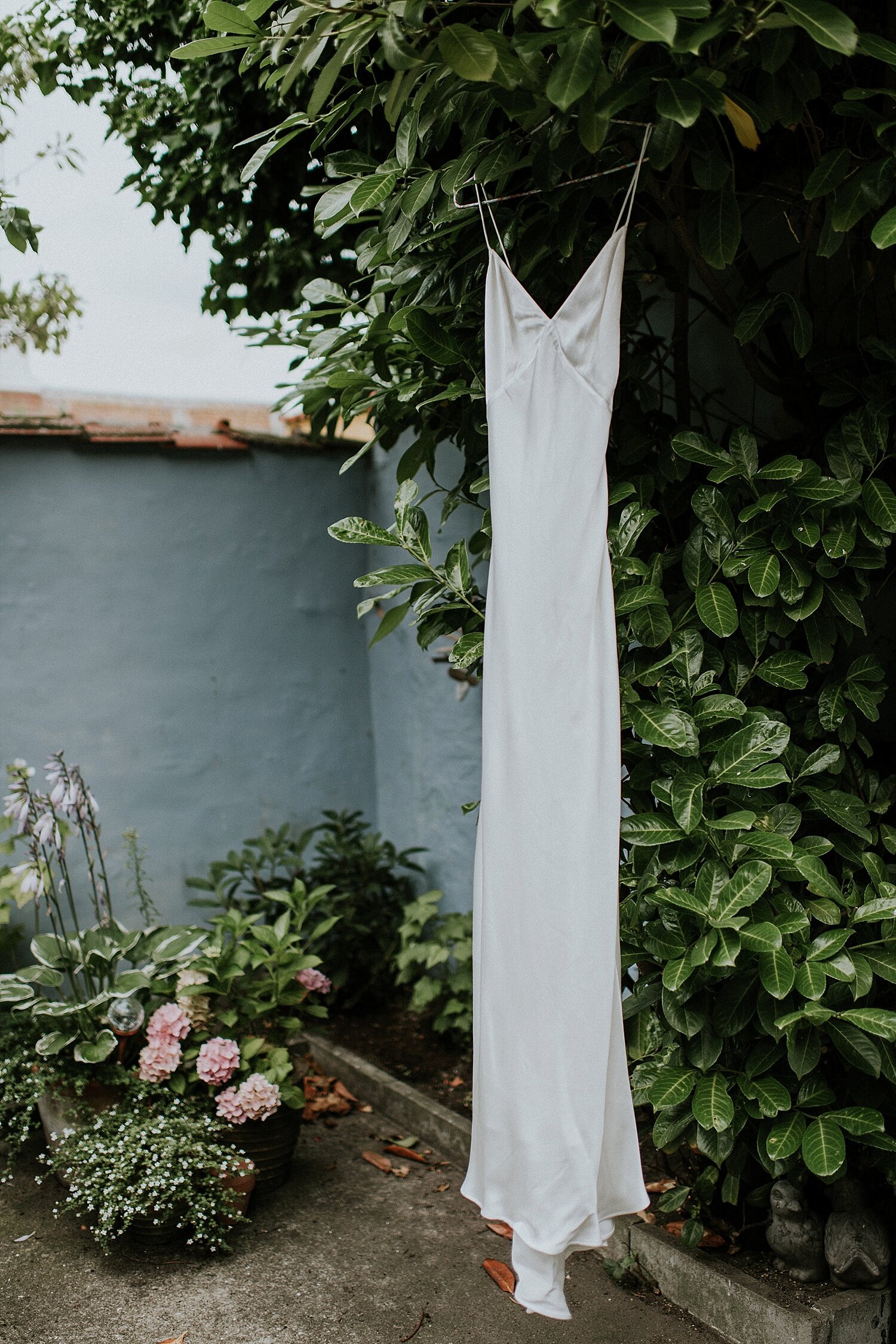 Wedding dress hanging outside at The Merchant House wedding venue, Aero Island, Denmark