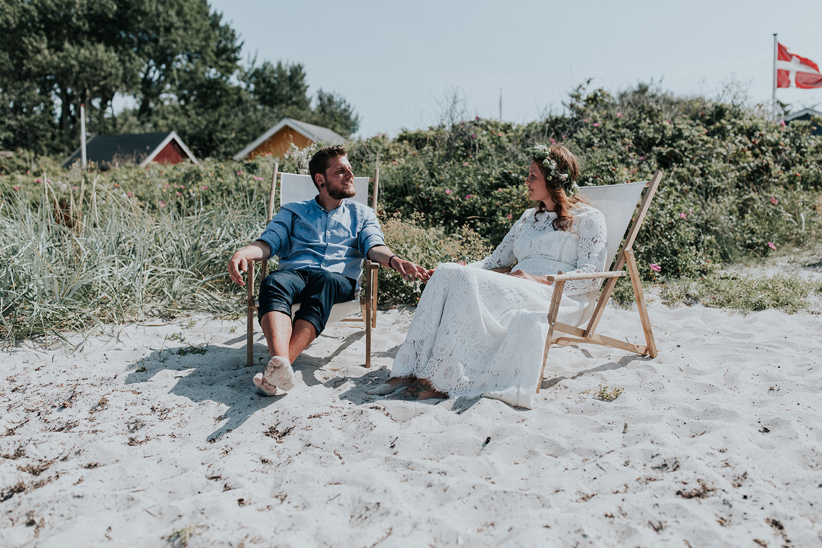 bride and groom at beach wedding ceremony - aero island, denmark - european destination wedding planned by danish island weddings