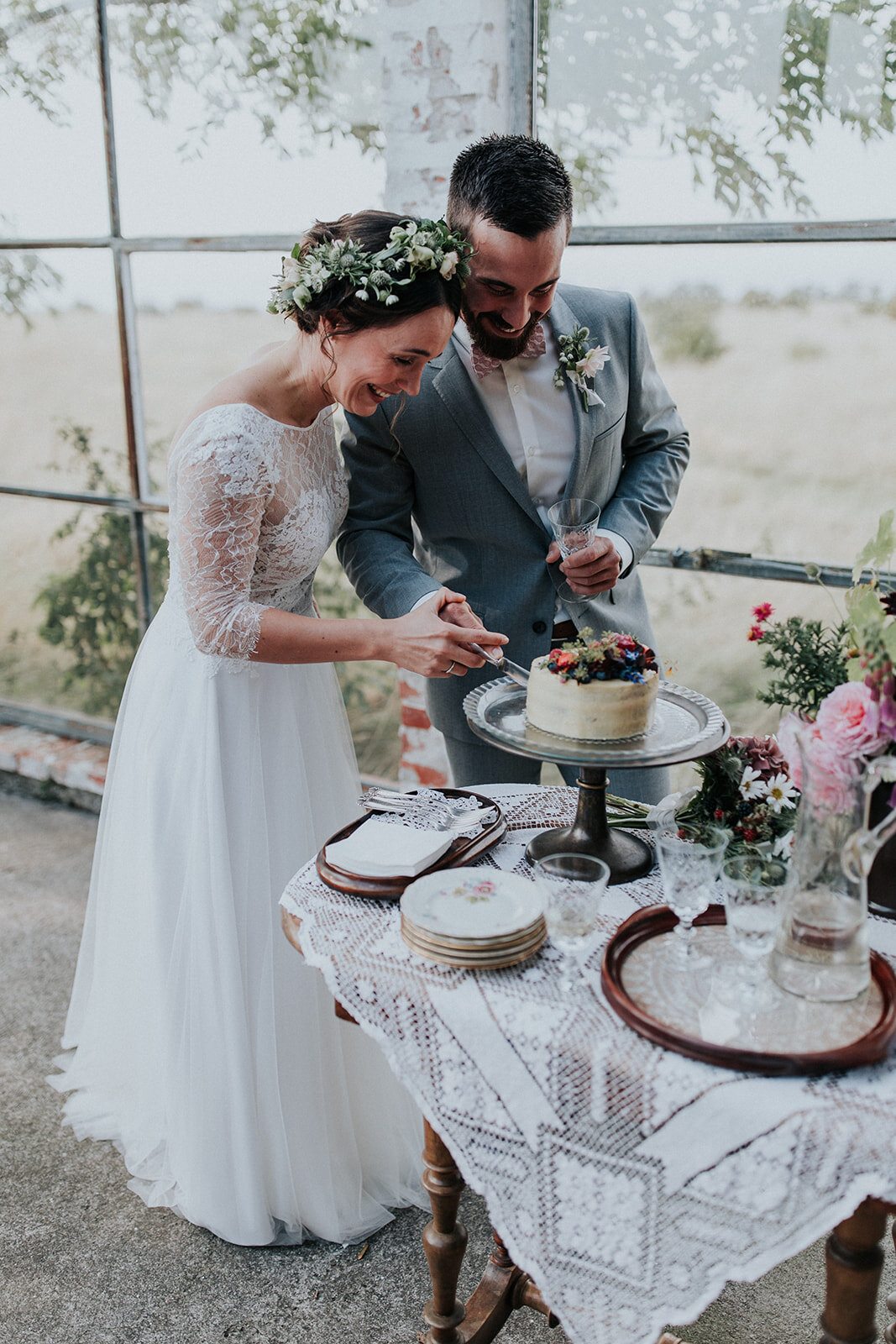 bride and groom at intimate rustic wedding ceremony - aero island, denmark - full service wedding planners - danish island weddings