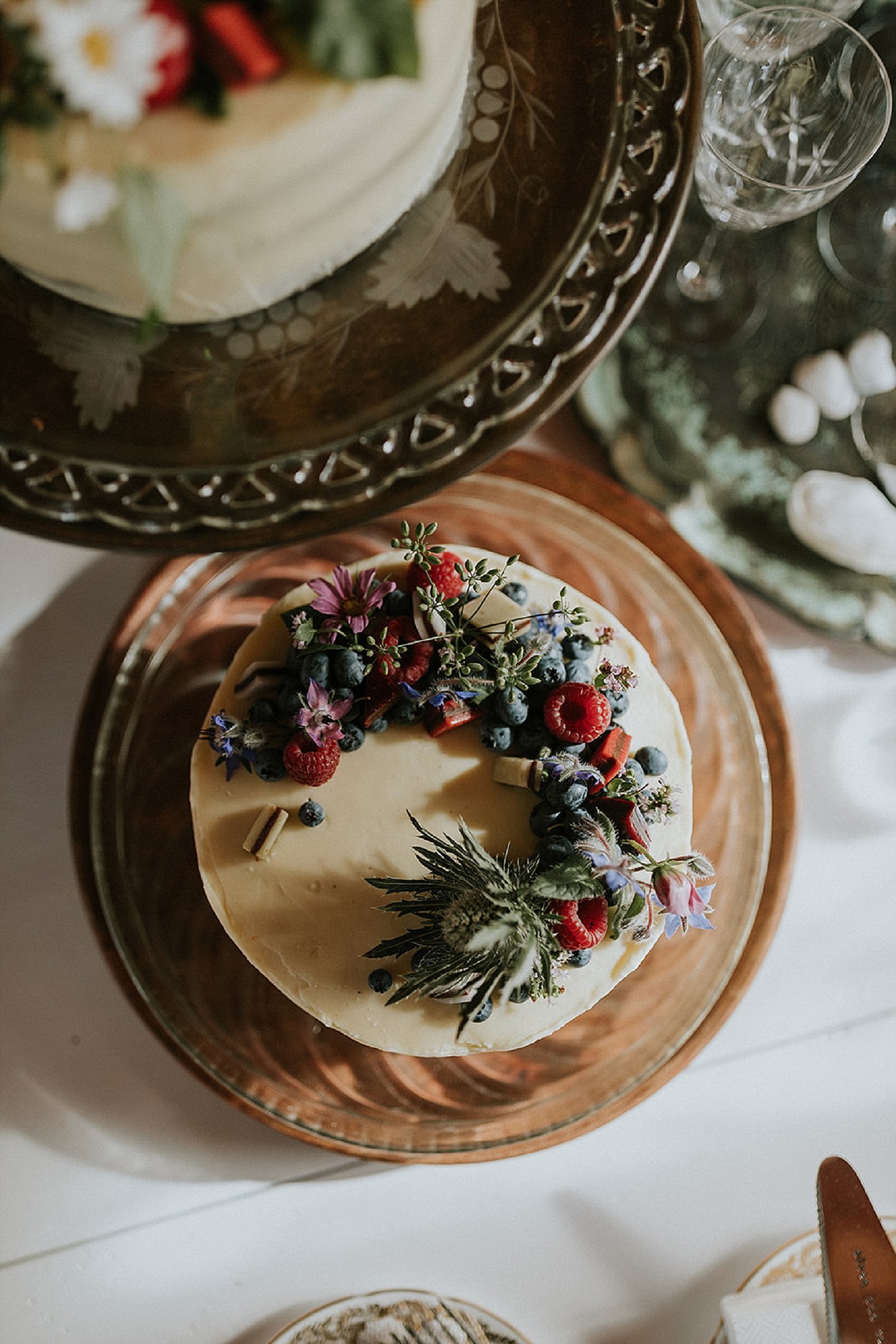 artisanal wedding cake with fruit and flowers | full-service destination wedding | get married in Denmark | Aero Island | Danish Island Weddings | Denmark wedding planners and venue