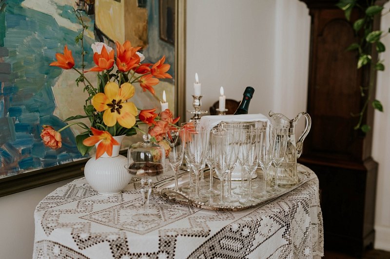 yellow and orange flowers on table | Aero Island wedding planners | Denmark weddings and florists