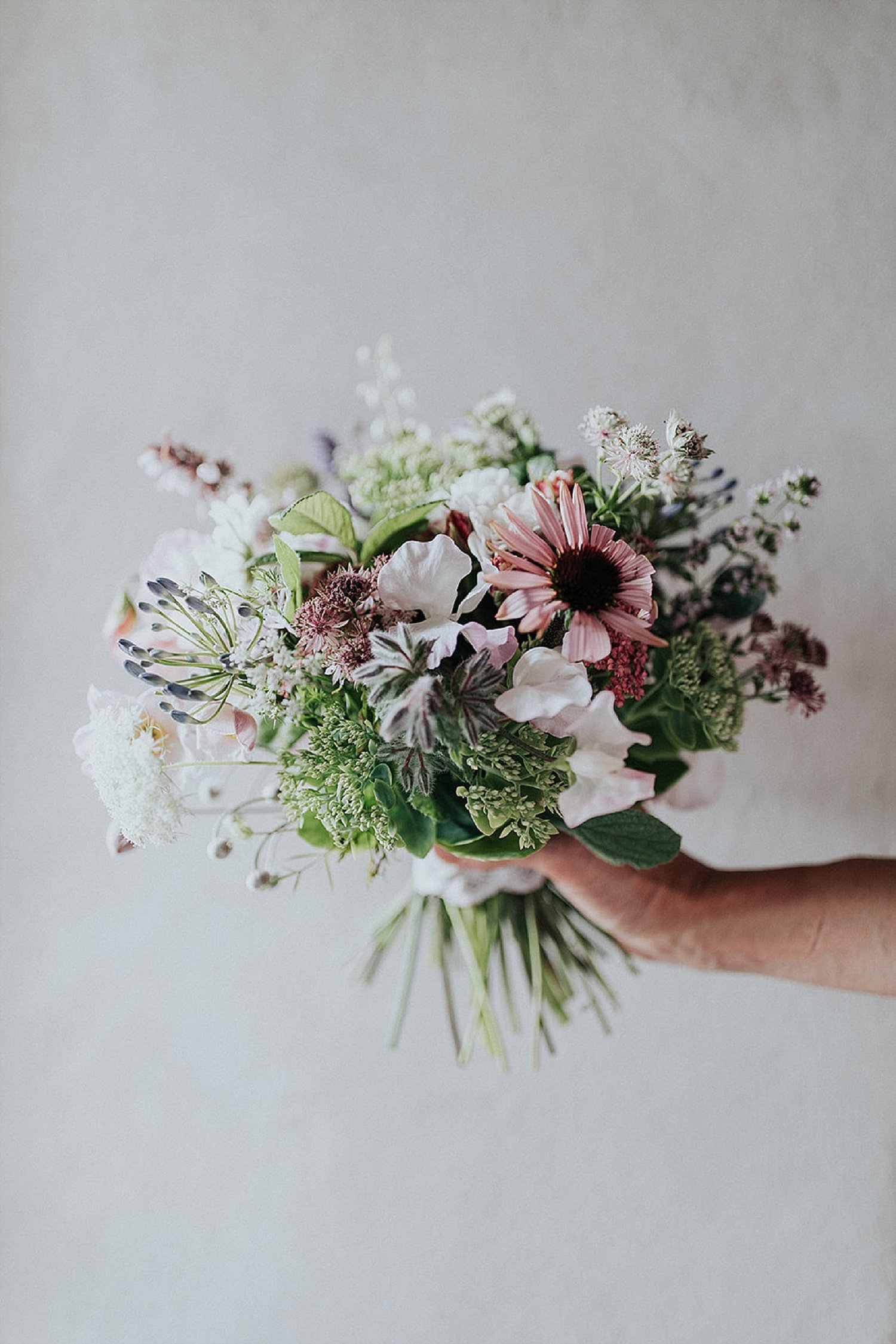 Fresh floral bouquet in hand - Danish Island Weddings