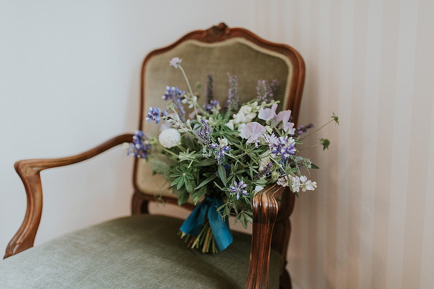 Bridal bouquet on vintage chair