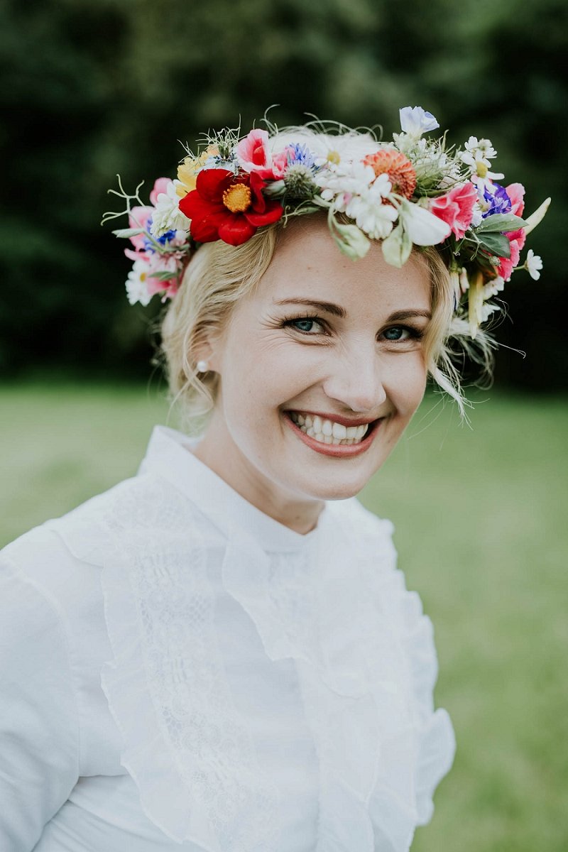 woman with colorful floral crown | Aero Island | Danish Island Weddings | Full service Denmark wedding planners