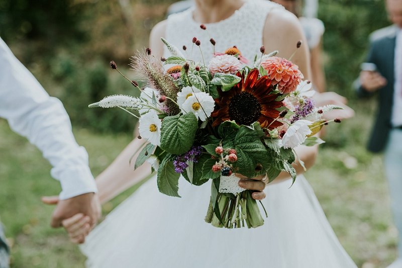 bride with large summer bouquet | Get married abroad | Aero Island | Danish Island Weddings | Full service Denmark wedding planners