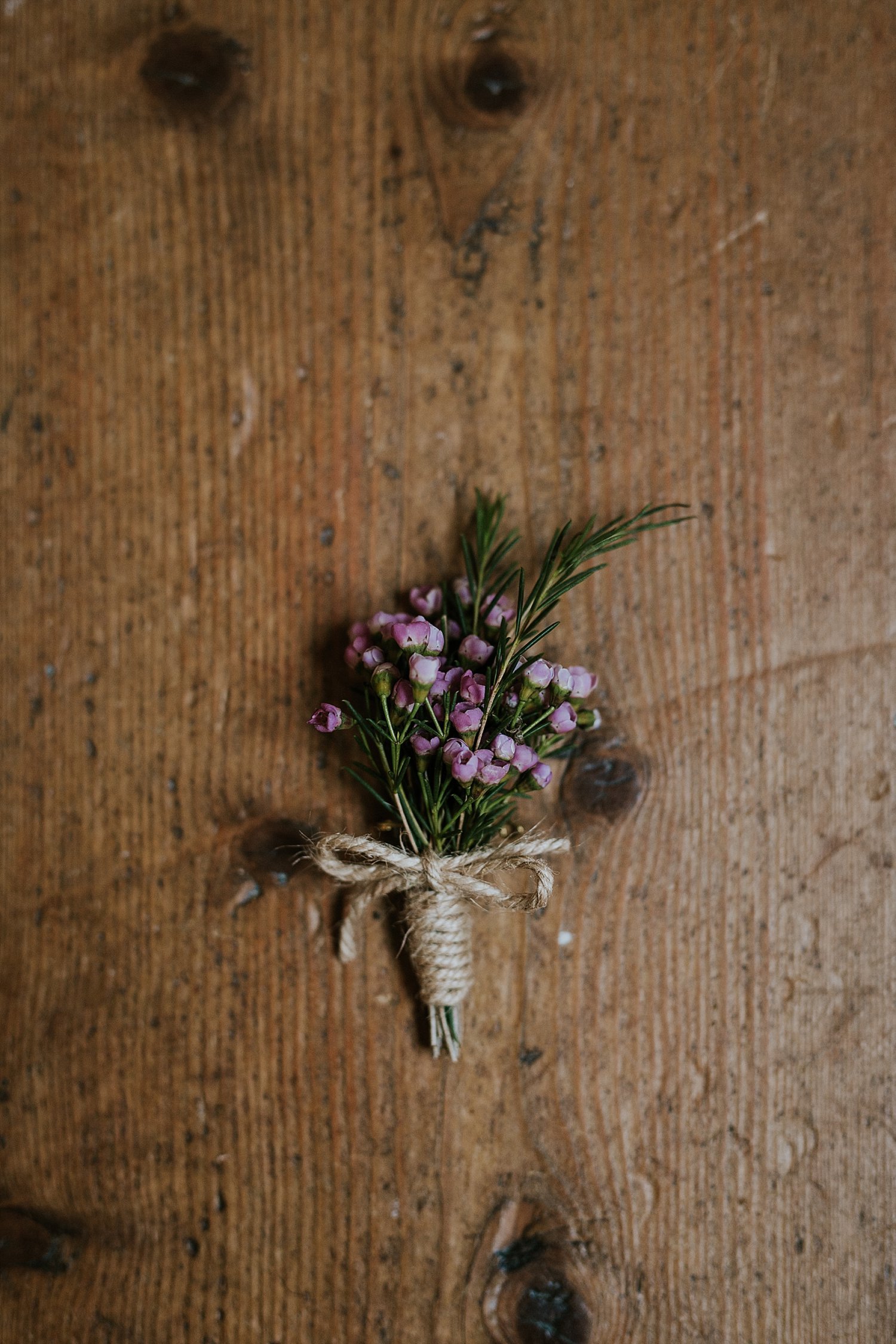 purple groom's boutonniere for winter wedding | winter wedding flowers | destination wedding | get married in Denmark | Aero Island | Danish Island Weddings