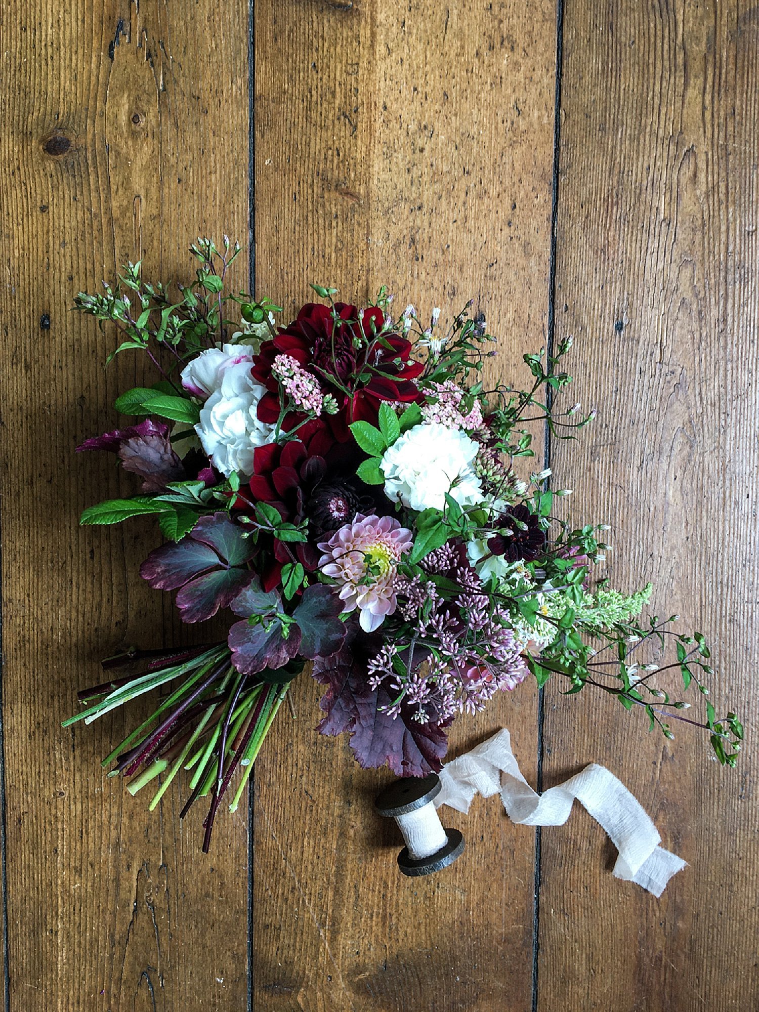 bohemian boho bridal bouquet with dark purple and white | fall autumn wedding flowers | elope abroad | Aero Island | Danish Island Weddings | Full service Denmark wedding planners 