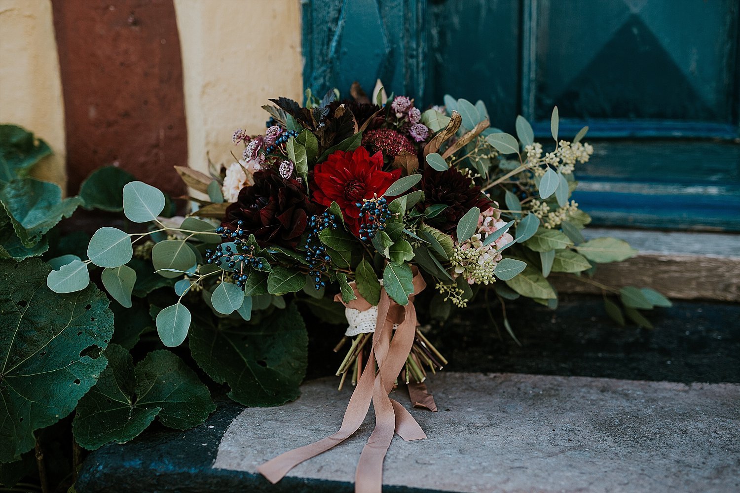 fall autumn rustic wedding bouquet on porch step | get married in Europe | Aero Island | Danish Island Weddings | Full service Denmark wedding planners 