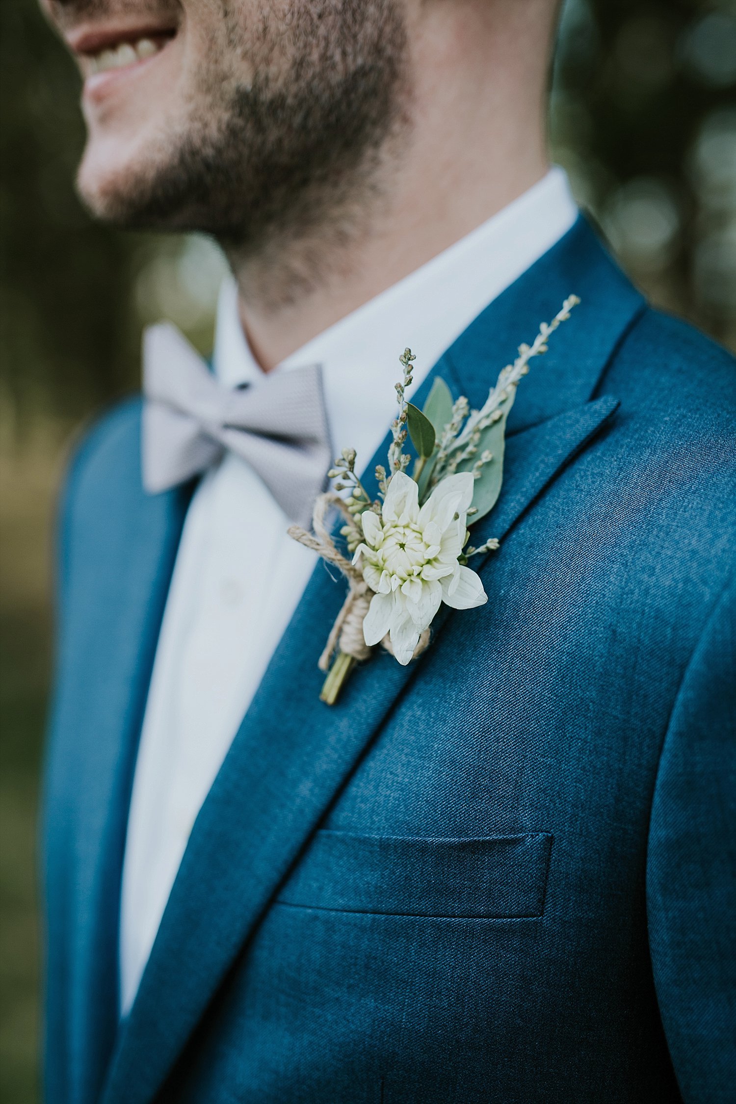 groom with boutonniere 