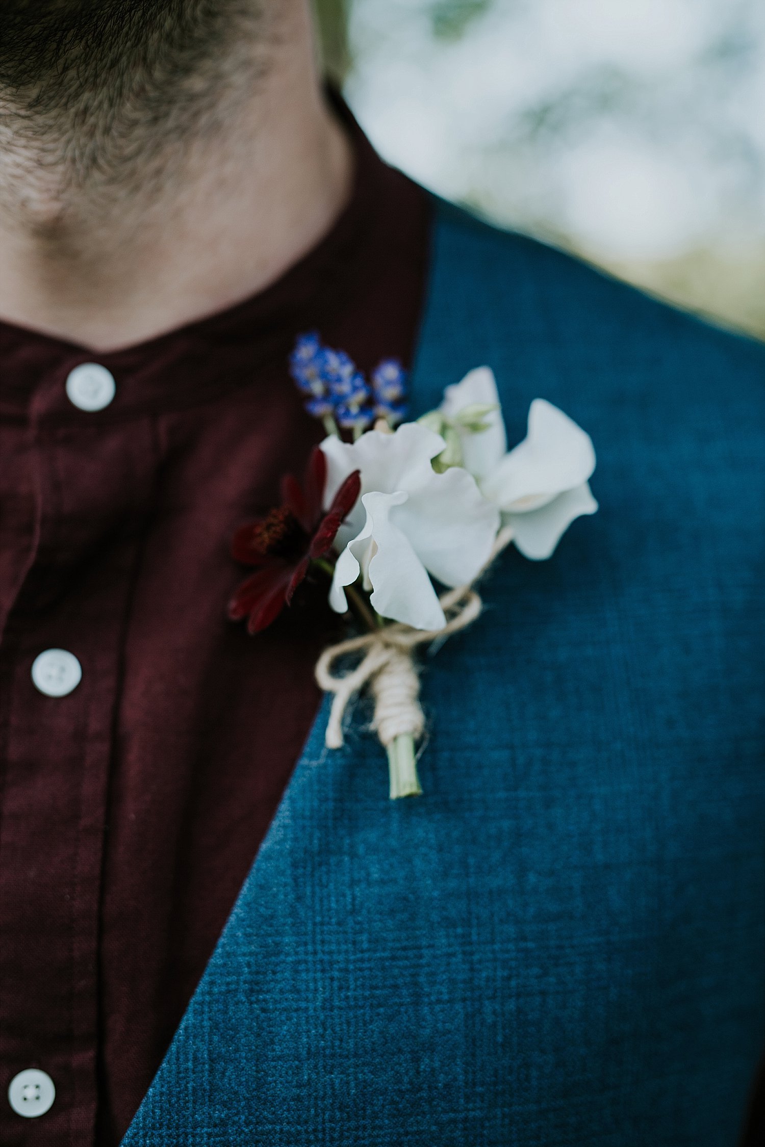 Groom with boutonniere - outdoor wedding in Denmark