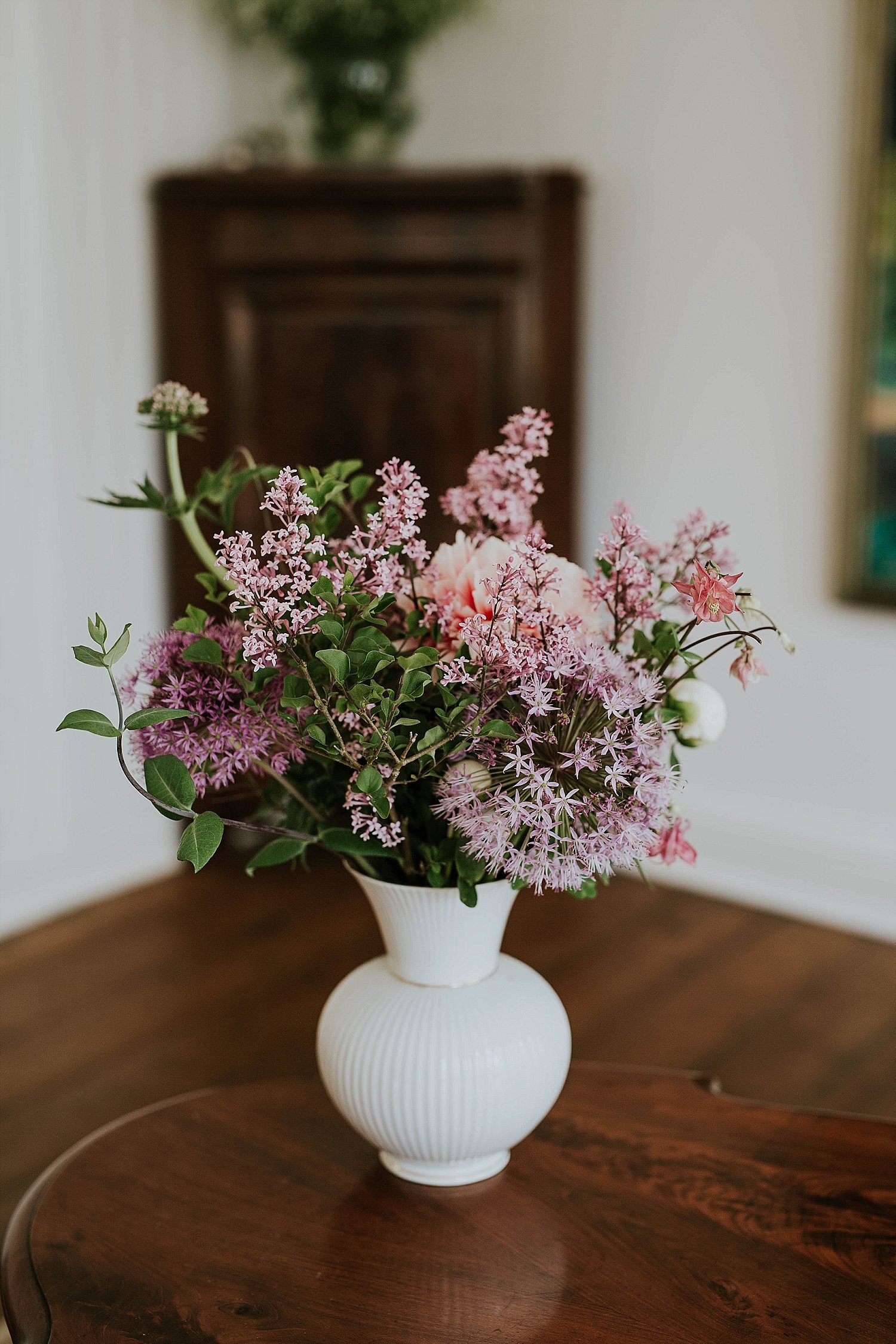 fresh flowers in white vase on table | Aero Island | Danish Island Weddings | Full service Denmark wedding planners