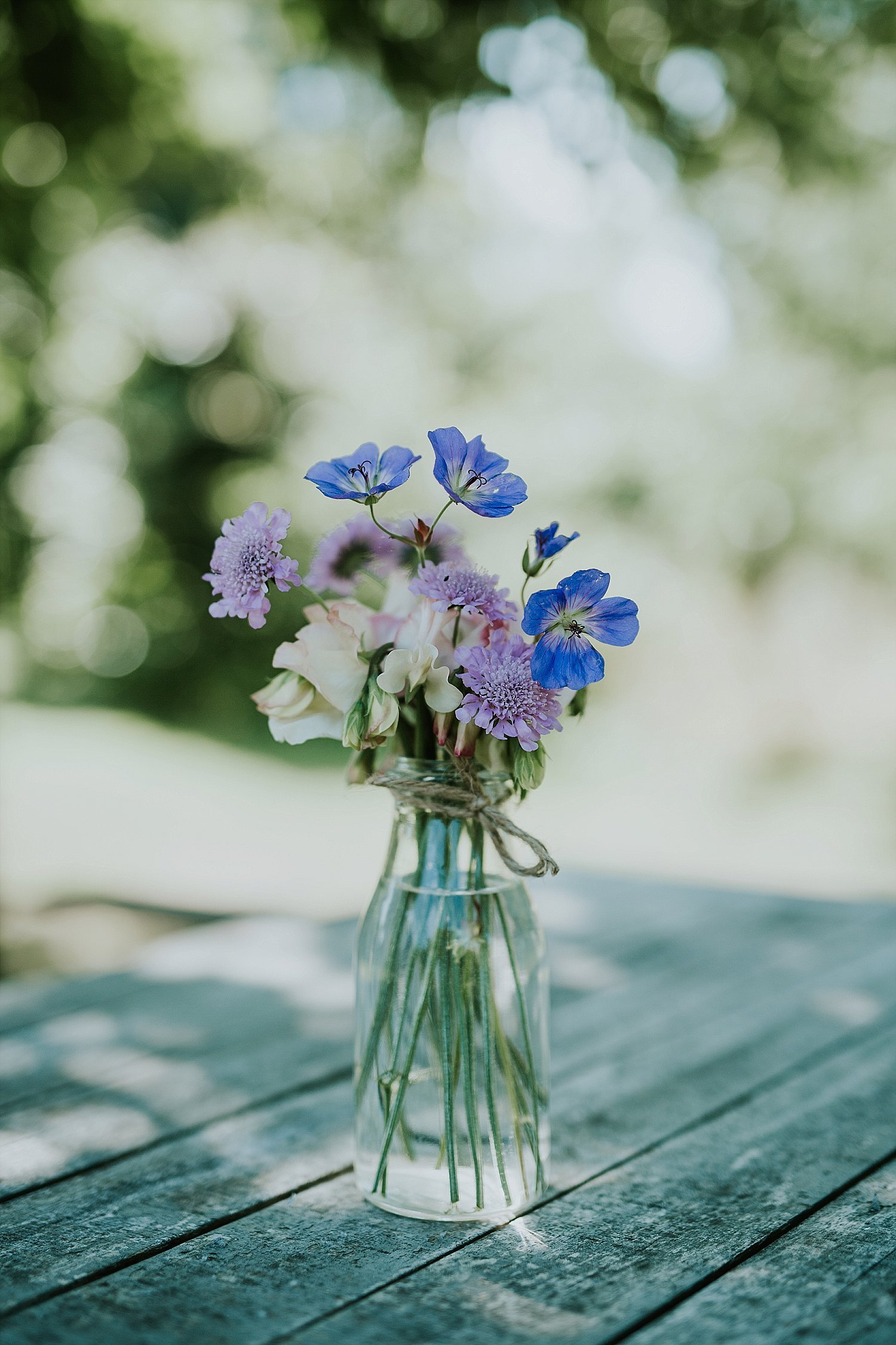 fresh flowers in glass vase on table | Aero Island | Danish Island Weddings | Full service Denmark wedding planners