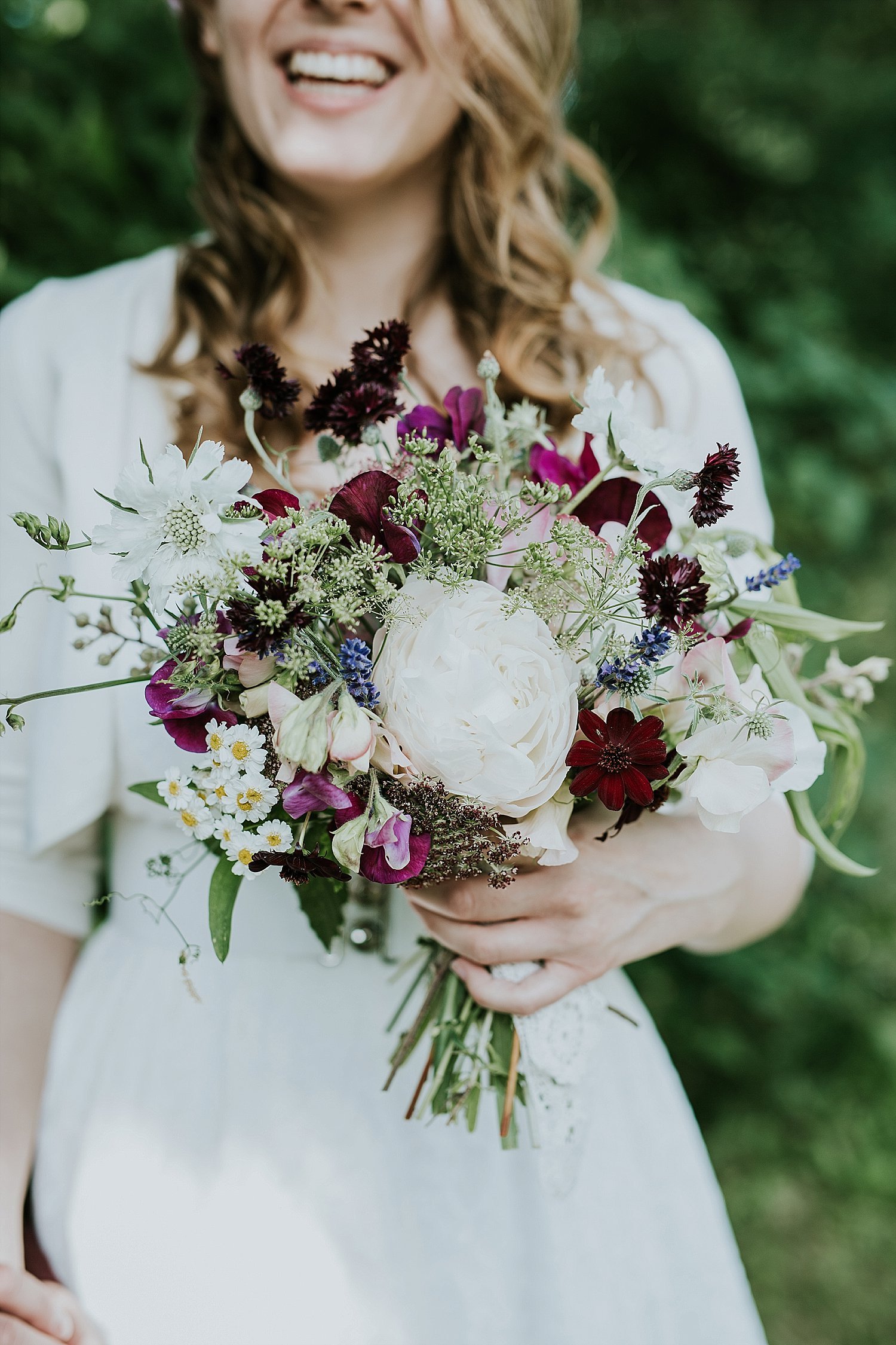 Bride with hand-tied bouquet