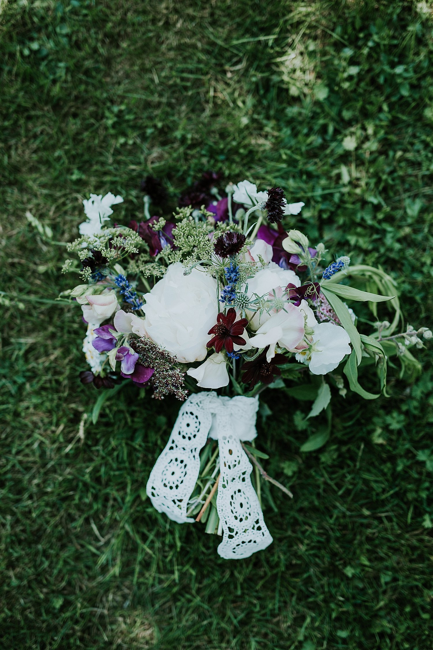 modern country garden style wedding bouquet on grass | Aero Island | Danish Island Weddings | Full service Denmark wedding planners