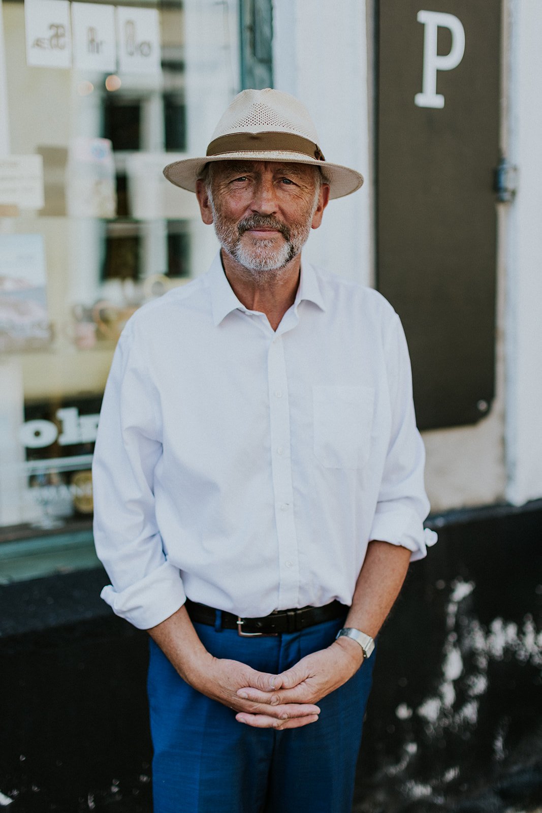 John Moloney, the distinguished English gentleman in a straw hat and white shirt, husband of founder Louise for nearly three decades and the strong administrative and operational backbone behind Danish Island Weddings.