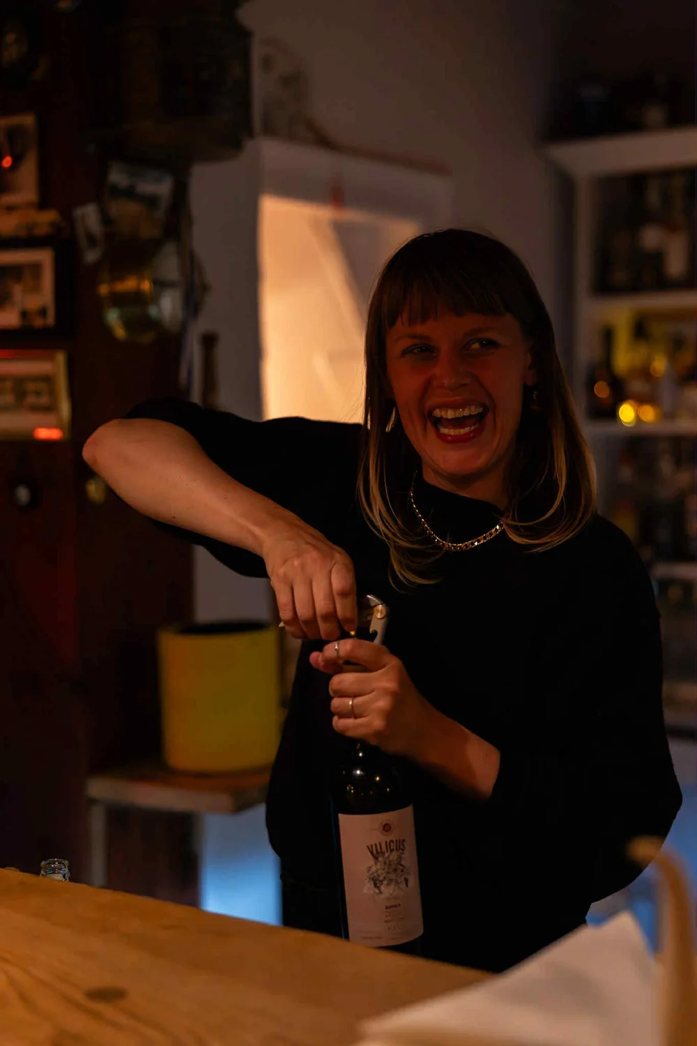 Gertrude behind the bar at Landogaarden.JPG