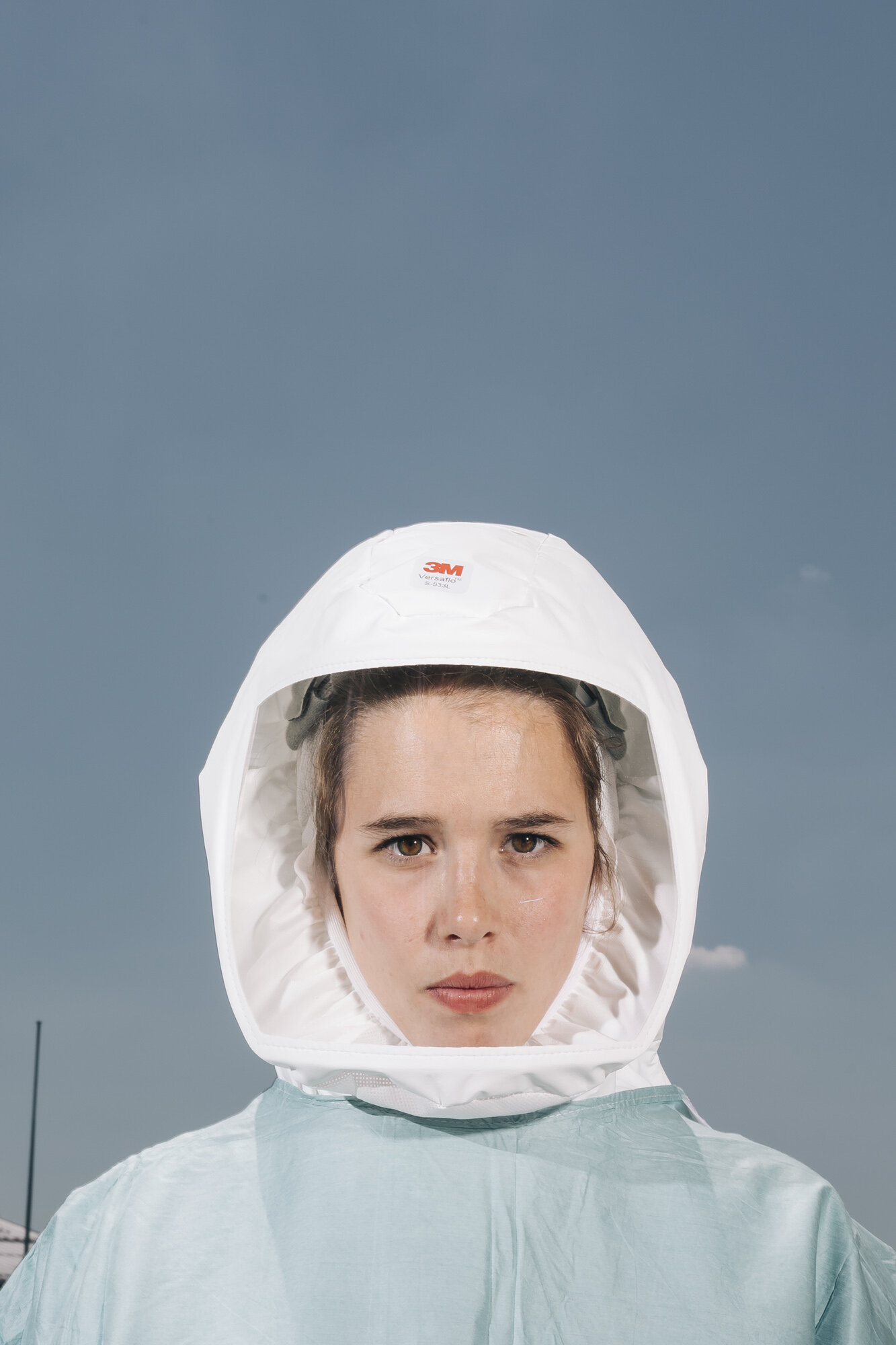  Soldier Adriana Helfen poses for a portrait. She is a medical-technicallaboratory assistant at the Institute forMicrobiology of the German Armed Forcesin Munich. She wears a protective suit withwhich the soldiers in the high-security laboratoryprote