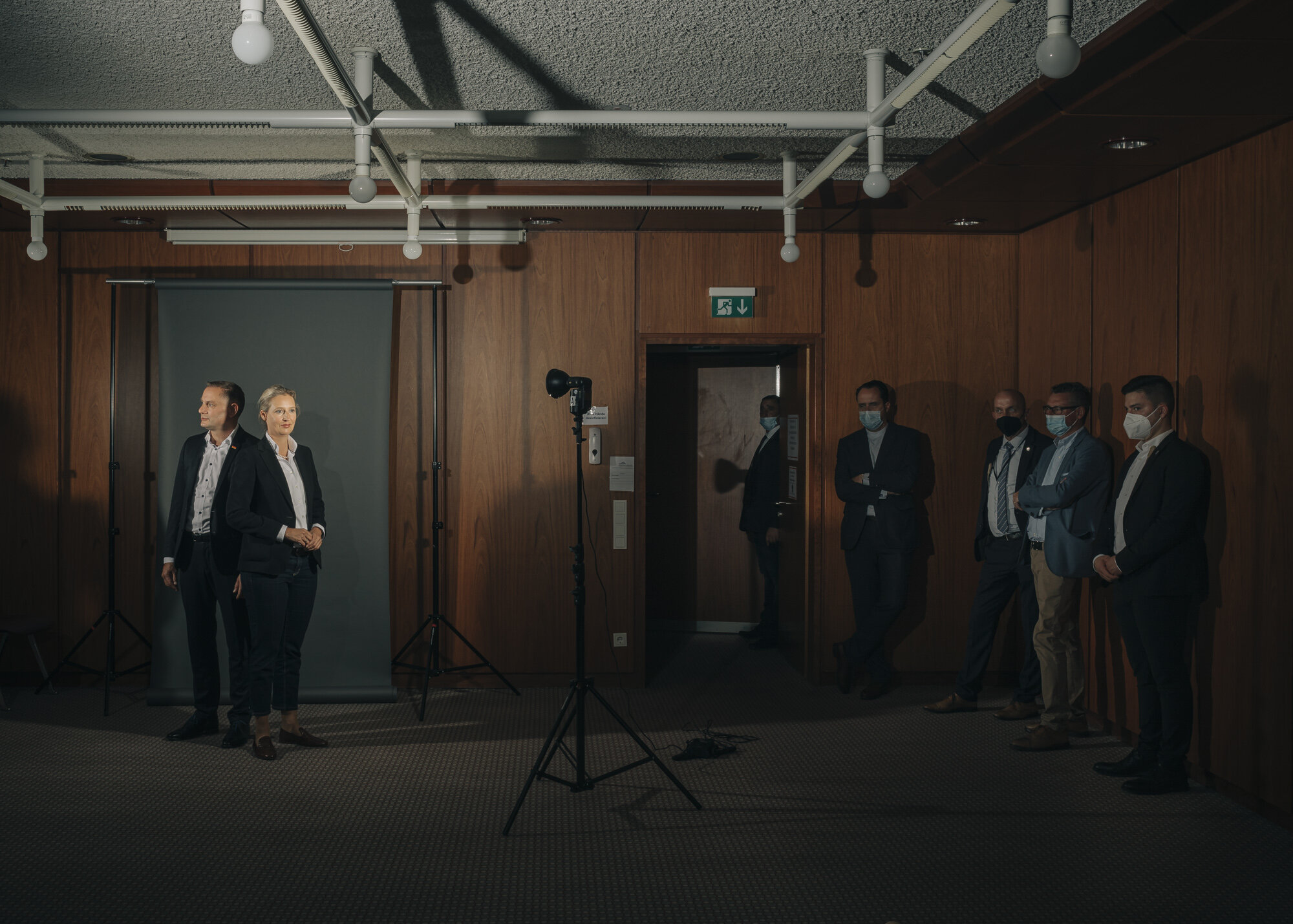  The top duo of the AFD, Tino Chrupalla and Alice Weidel pose for a portrait during an election campaign event. Bodyguards as well as assistants of the politicians wait on the right. 