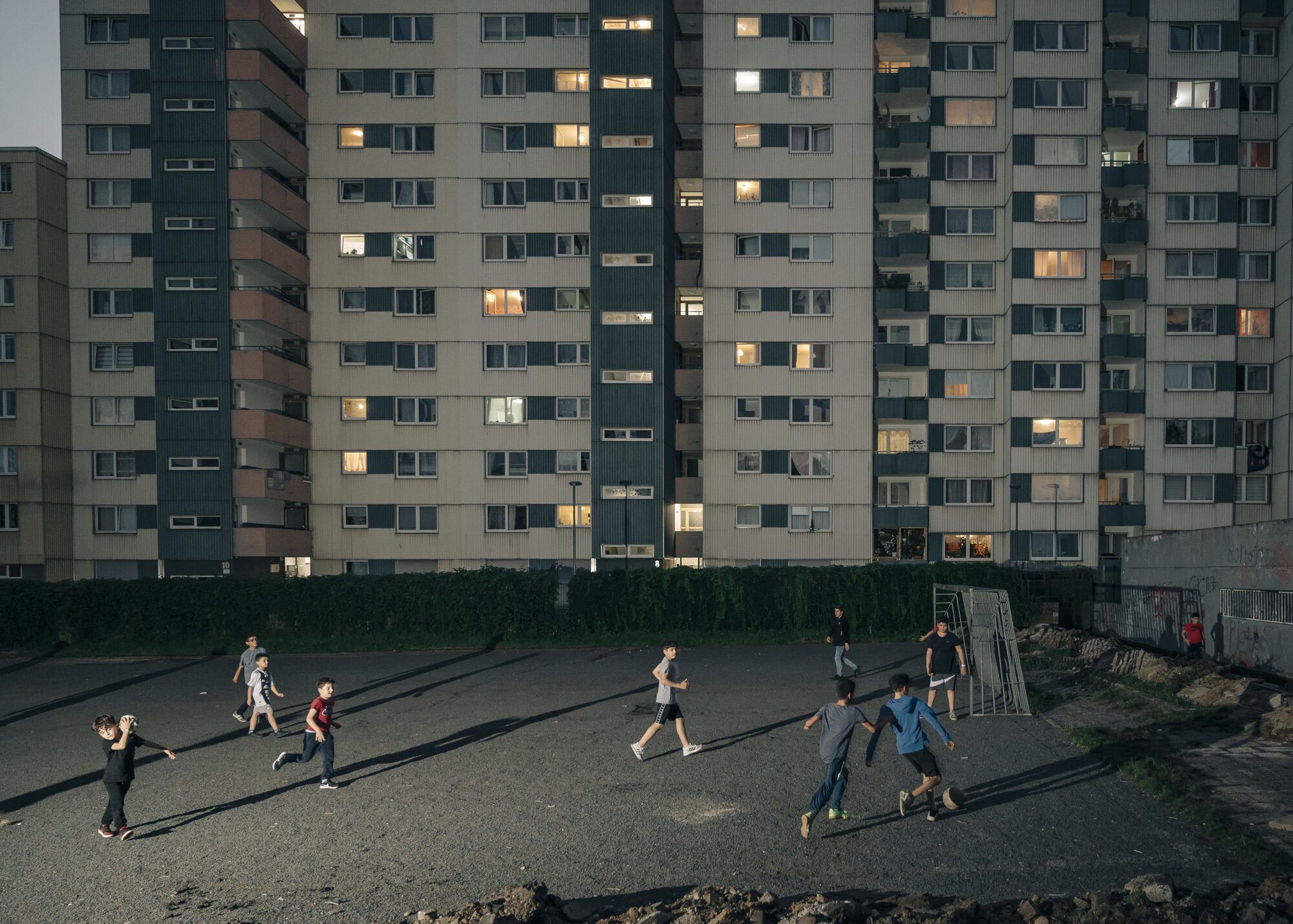  Children playing football in front of a house in Cologne Porz. 