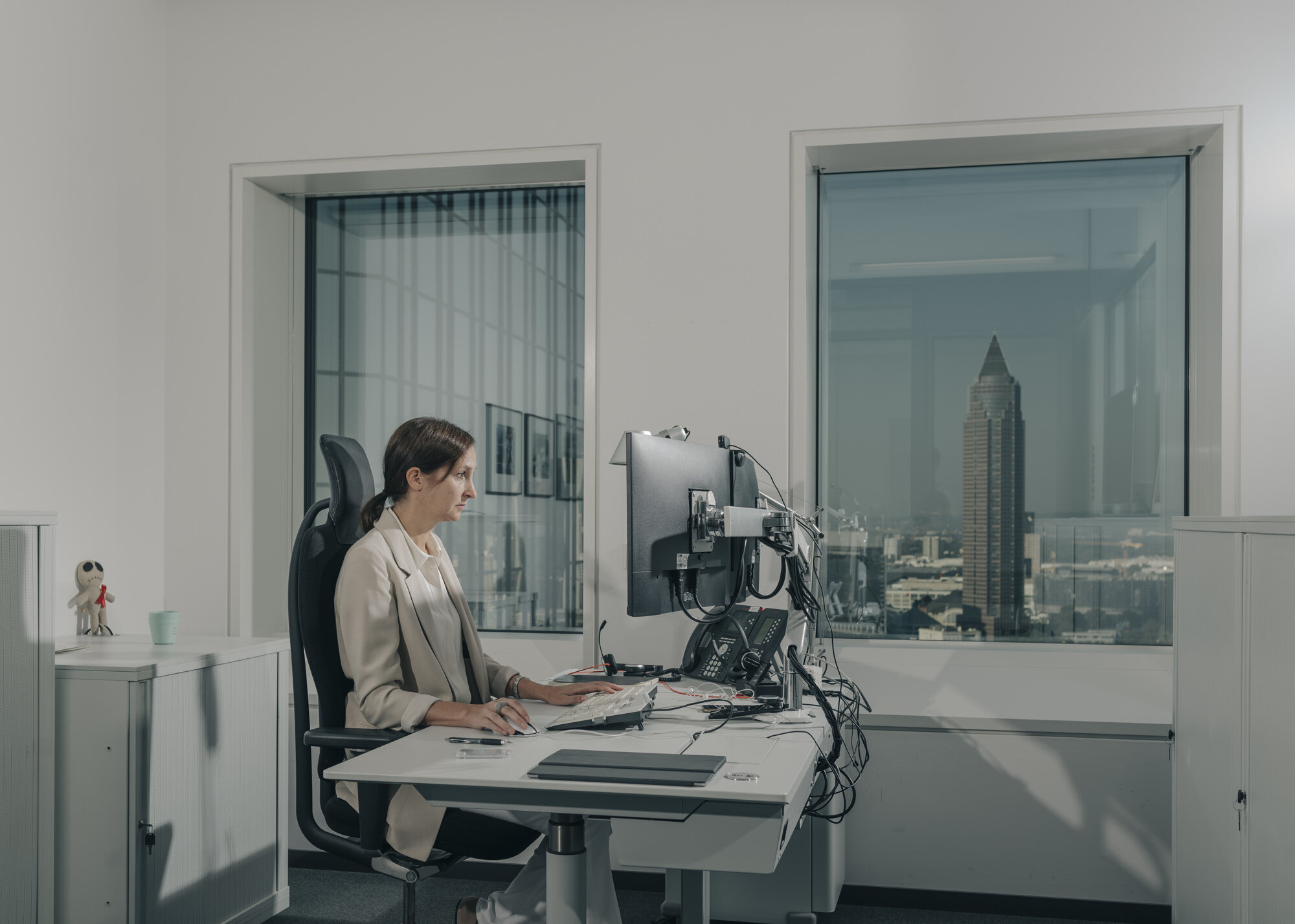  Deutsche Bank's deputy group spokesperson in Frankfurt works in her office at the group's headquarters. 