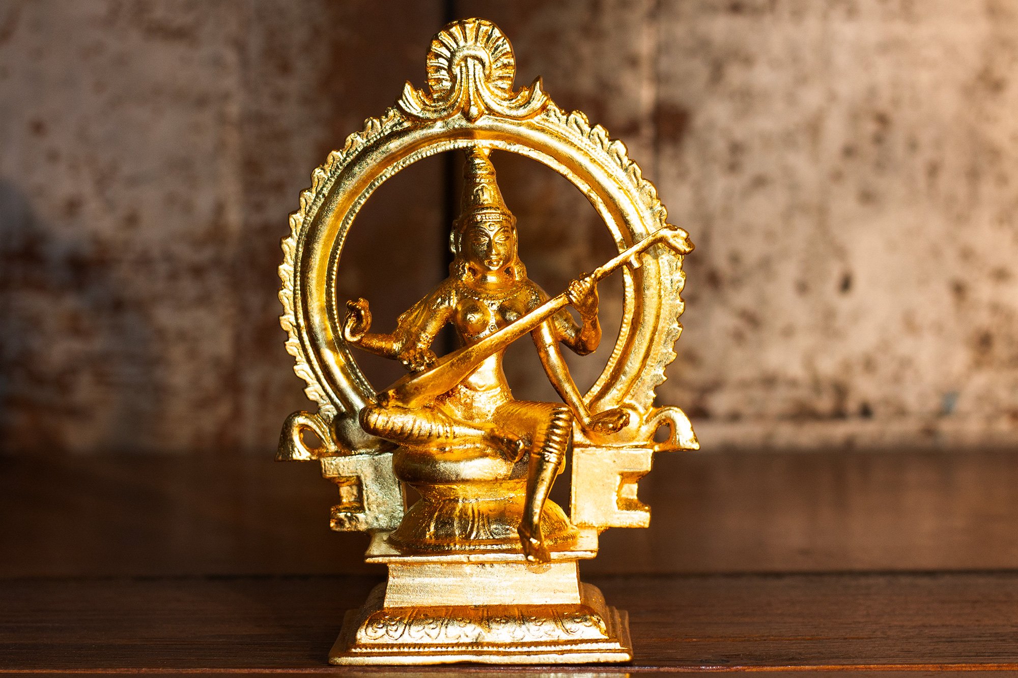 Gold Leafing: Saraswati Statue