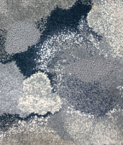 Detail of a 16 color custom nylon carpet specified for a corridor renovation by Kaid Design