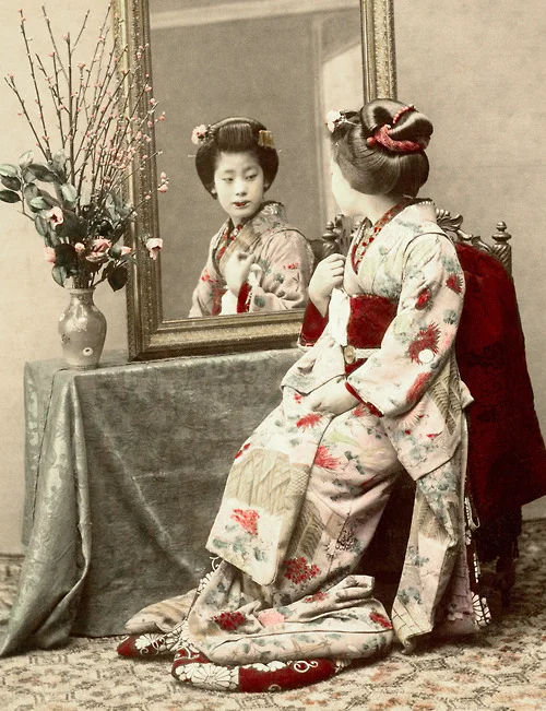 A Senior Maiko (Apprentice Geisha) wearing the Yakko Shimada hairstyle. 1880's, Japan