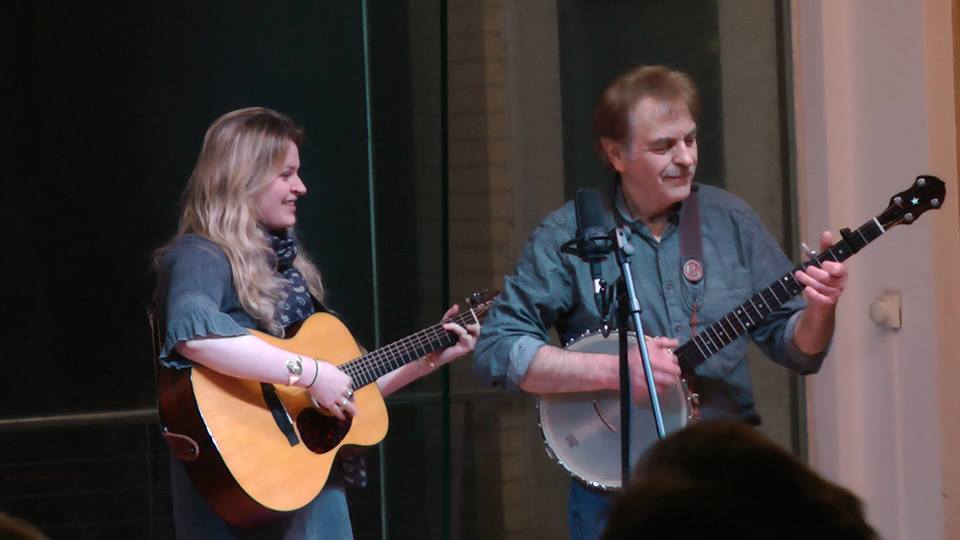 Eliza alongside Peter Acty on clawhammer style banjo at Calstock Arts.