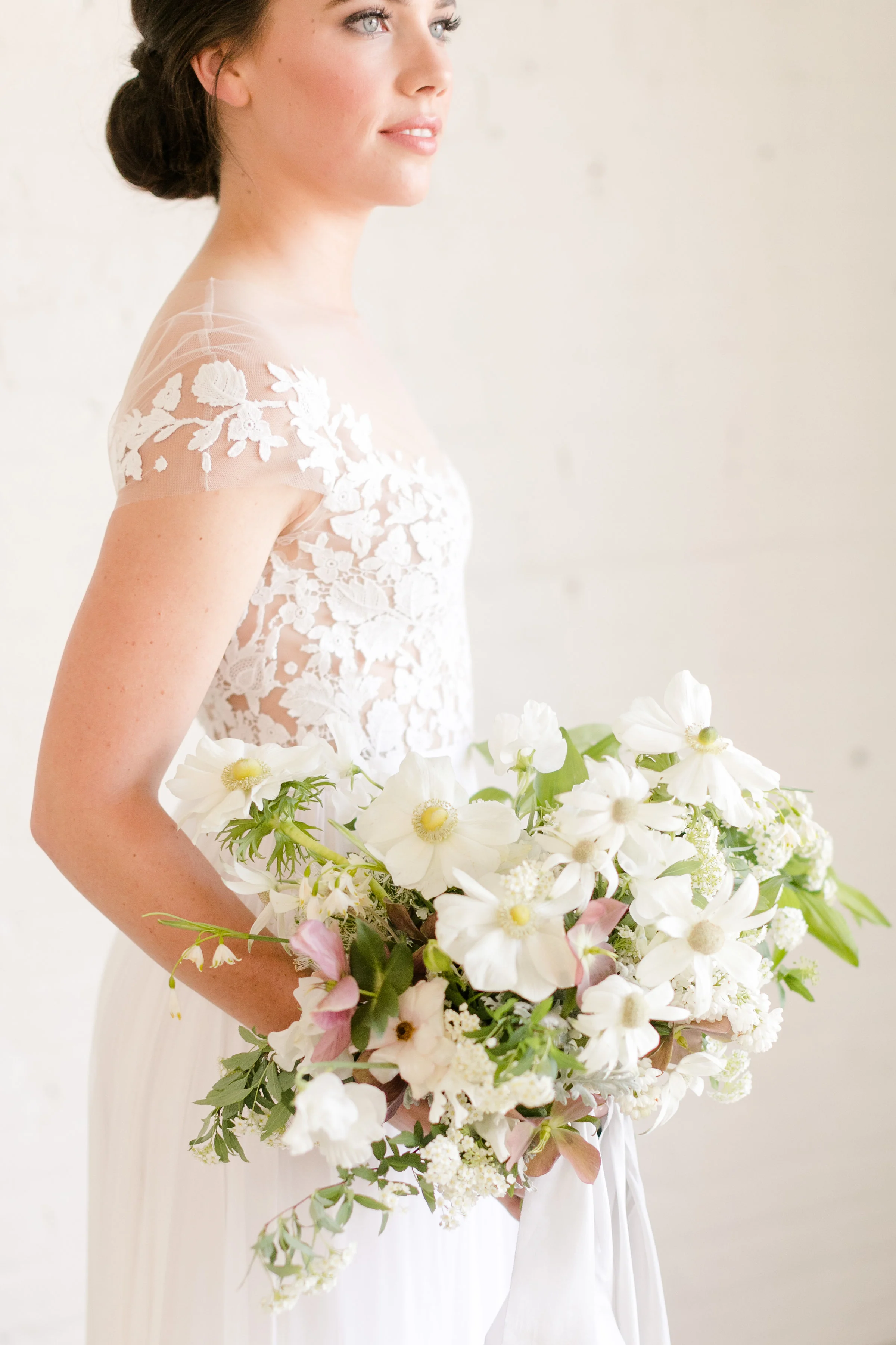 Jake Anderson Workshop Photo by Christy Janeczko Florals: Ashley Fox, Hair: Leah Grace Anderson, Dress: L'atelier Couture, Planning: Blush and Whim, Ribbon: Shasta Bell