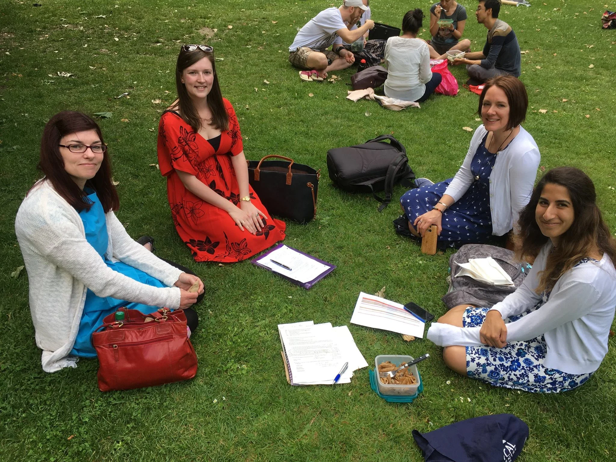 Busy brainstorming during a pod meeting in the park.