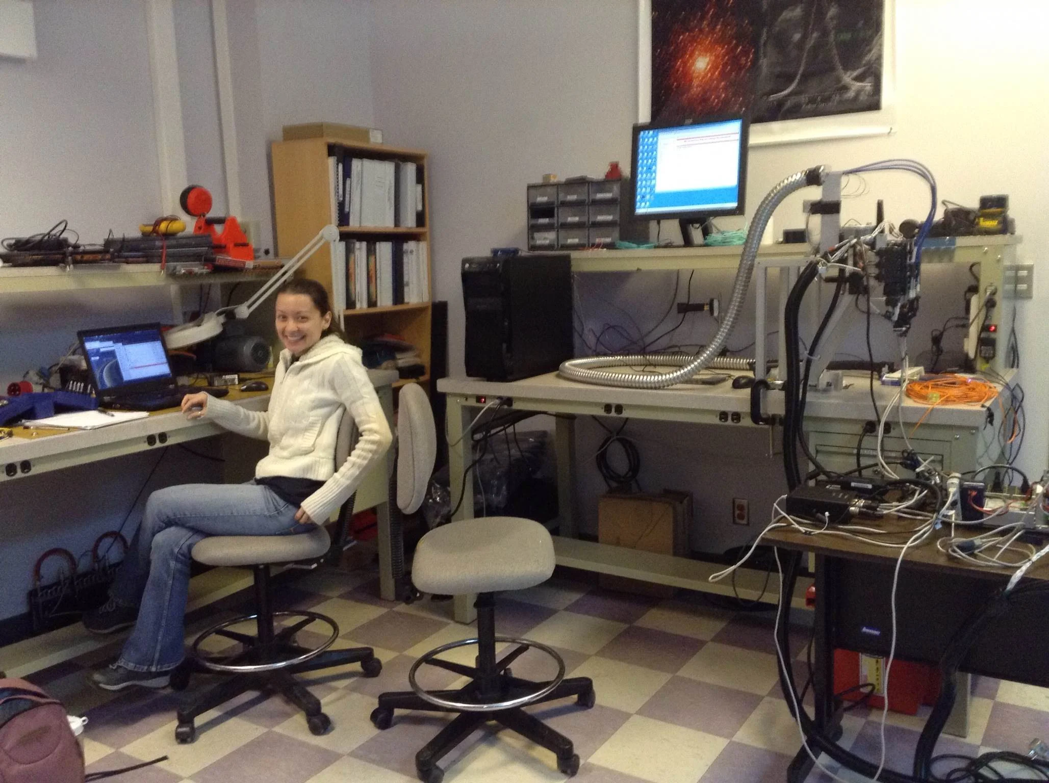 JoEllen with the failed instrument she tried to install on the SOAR telescope in Chile.