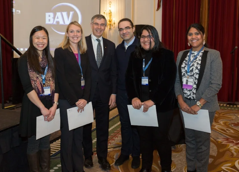 Aayushi receiving the Joshua E. Neimark award from the CEO of the American Association for the Advancement of Science, Dr. Rush Holt.