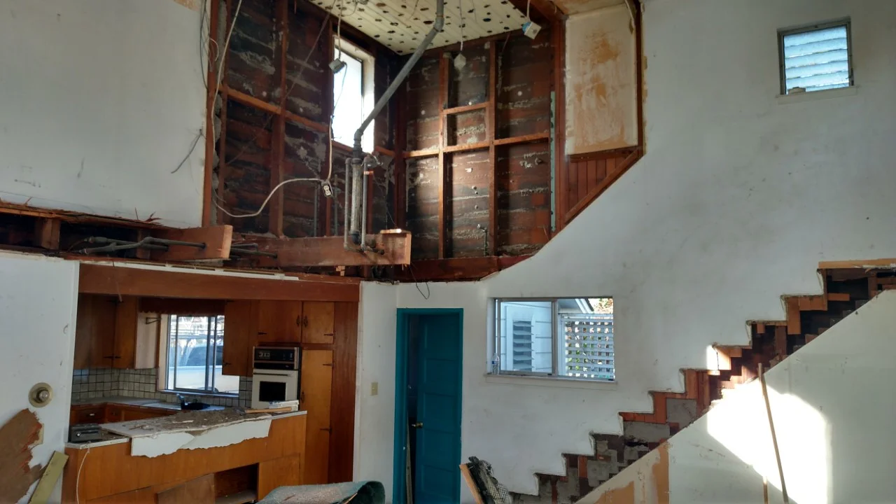THE INSIDE OF A GUTTED 1906 FARMHOUSE