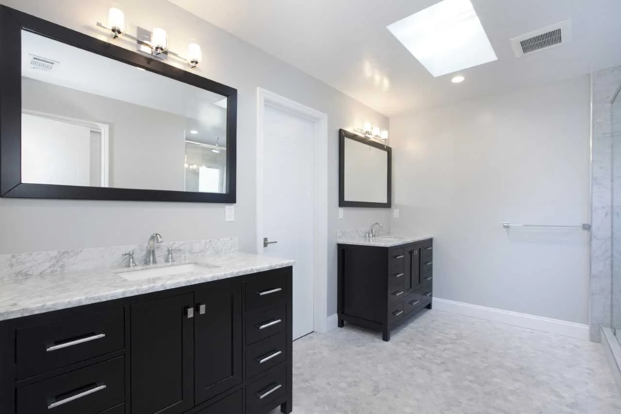 Master bath at Hermosa. Elegant use of natural stone with skylights providing abundant natural light.