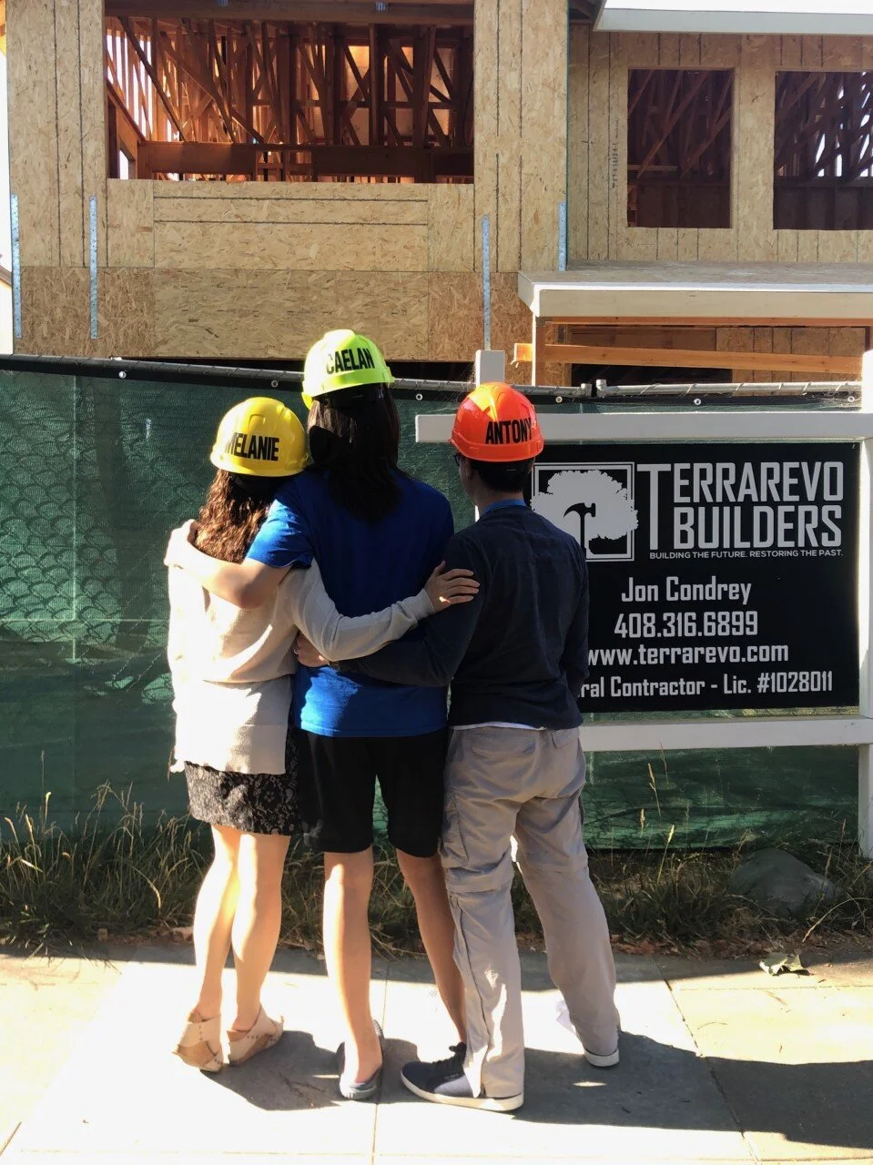 OUR CLIENTS SURVEYING CONSTRUCTION OF THEIR NEW CUSTOM HOME IN WILLOW GLEN