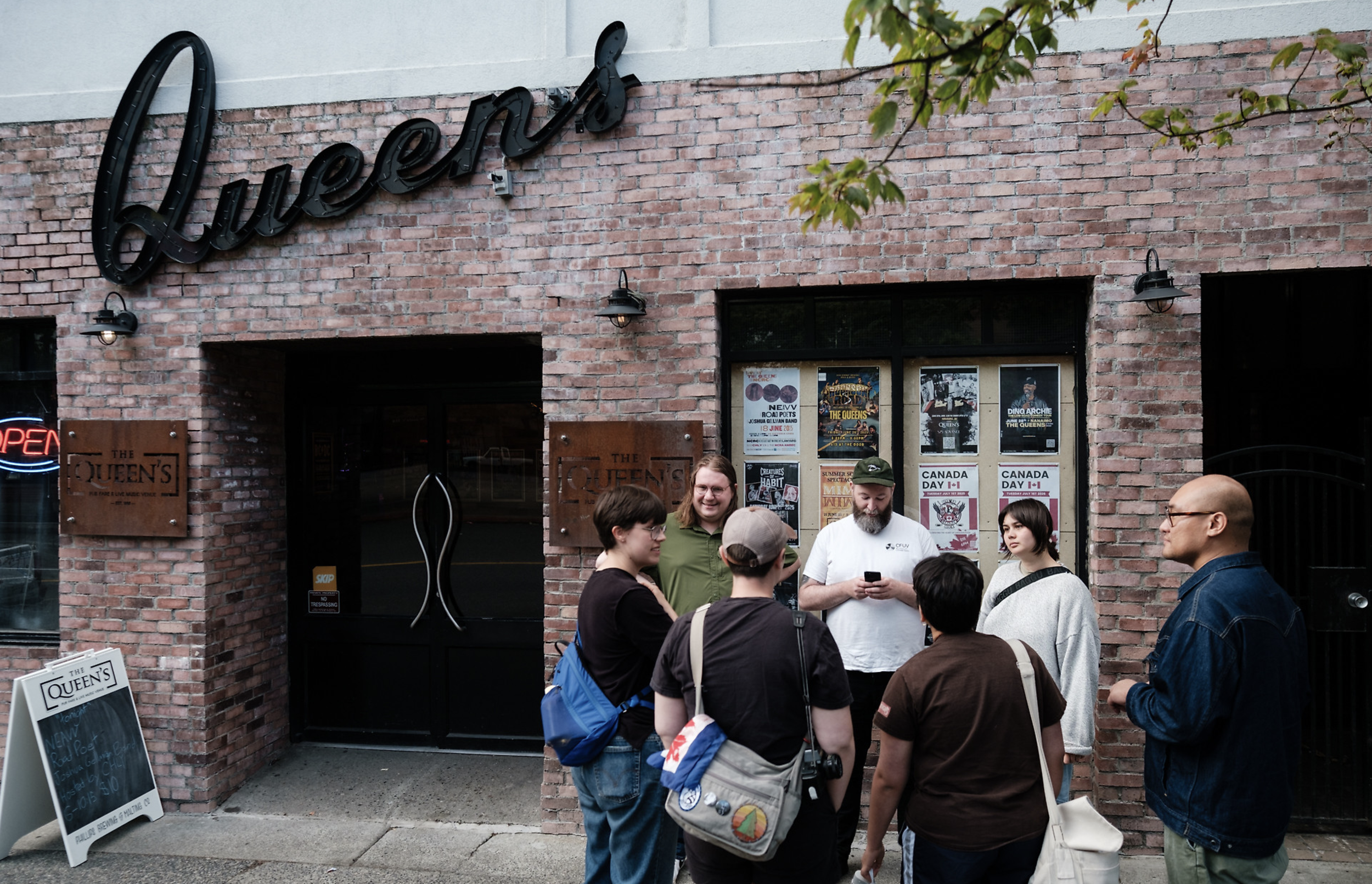 Attendees outside the Queens.