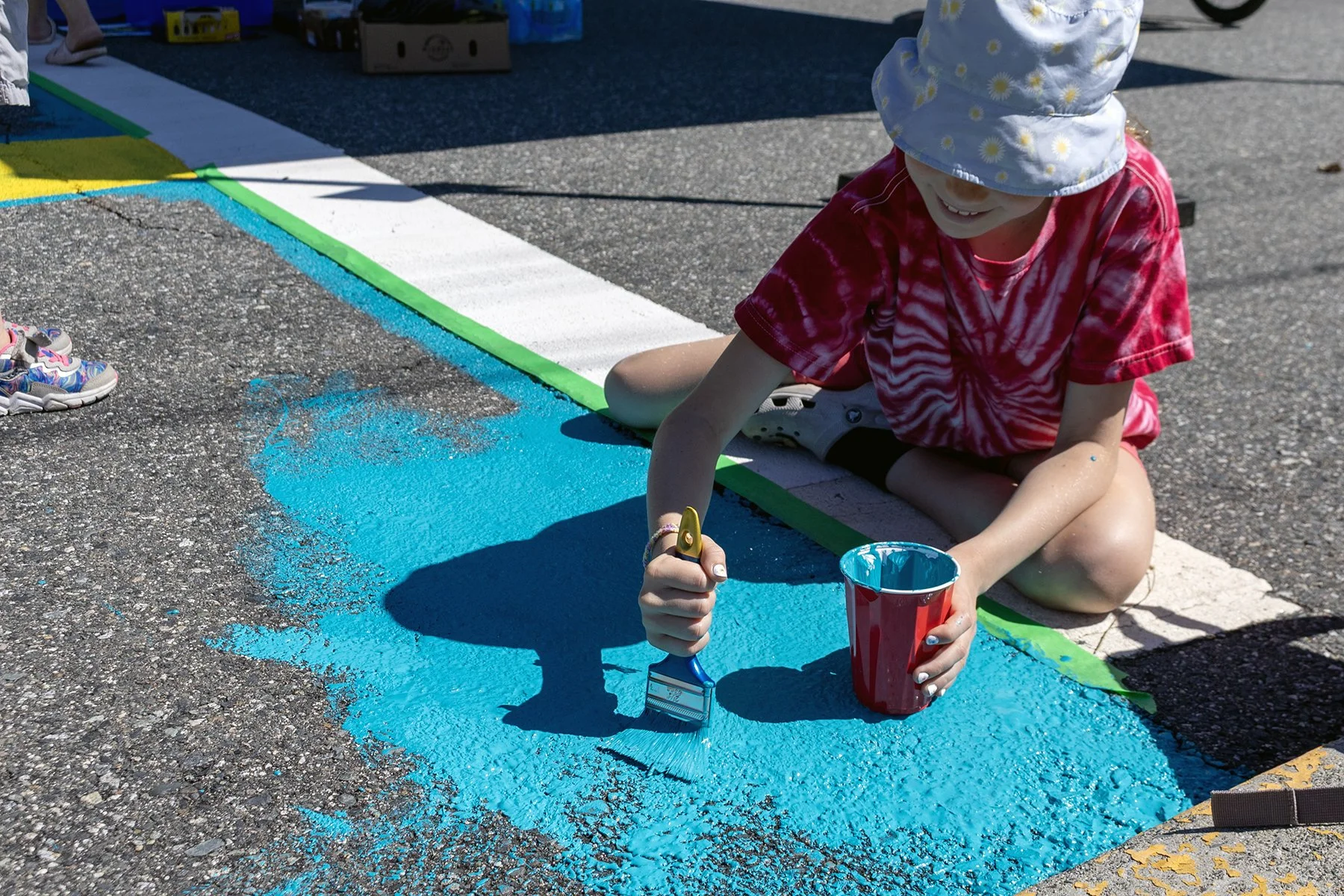 Ten year old Miriam said she is going to be excited to walk past the mural every day on the way to school knowing she helped work on it. 