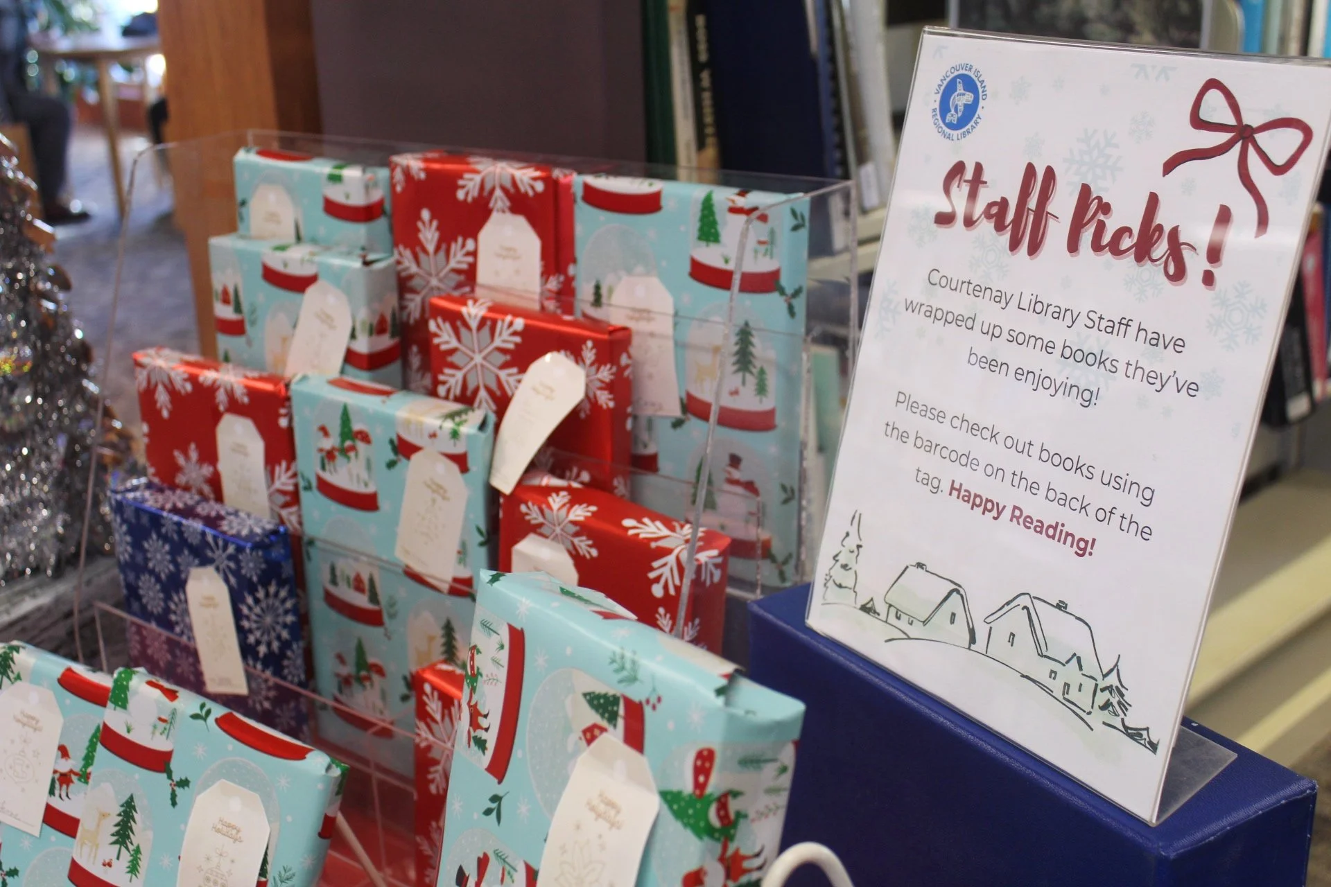 Gift-wrapped library books lend holiday spirit