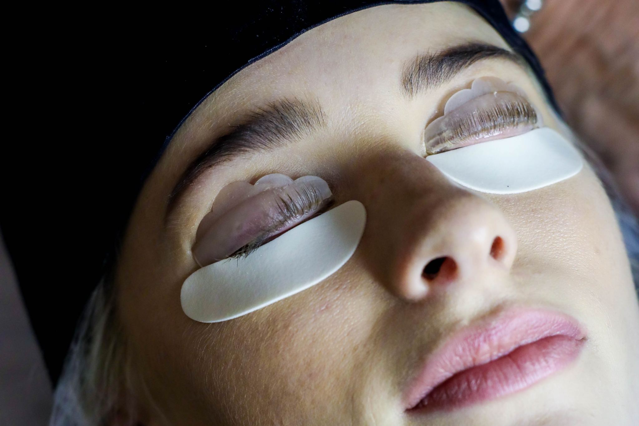 The process of getting your eyelashes lifted and tinted.