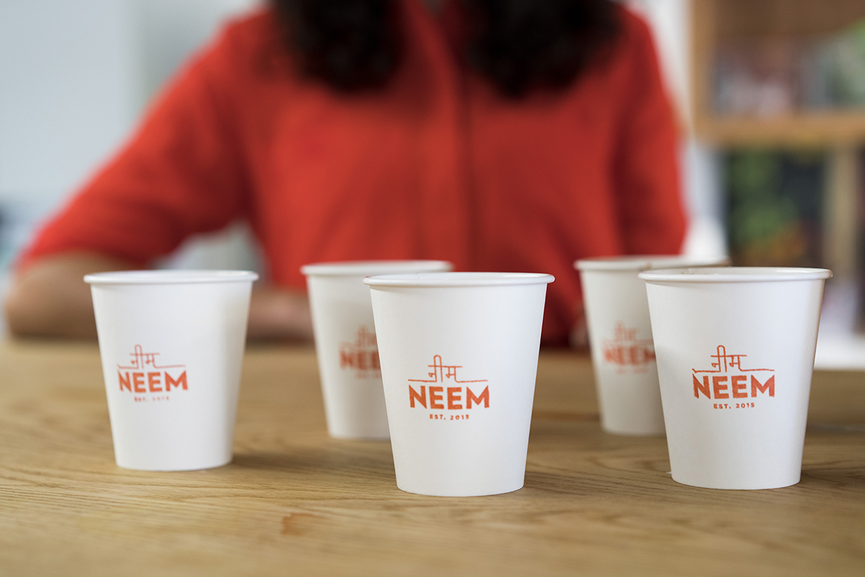As I started to apply the logo to some of the main pieces, like our cups, I realized that it's imperative that we keep the artisanal, hand-done feel of the brand to stay true to the bigger vision. I decided to hand stamp each cup and the results were better than I had hoped. My favorite part if the imperfections that come with stamping each cup individually.